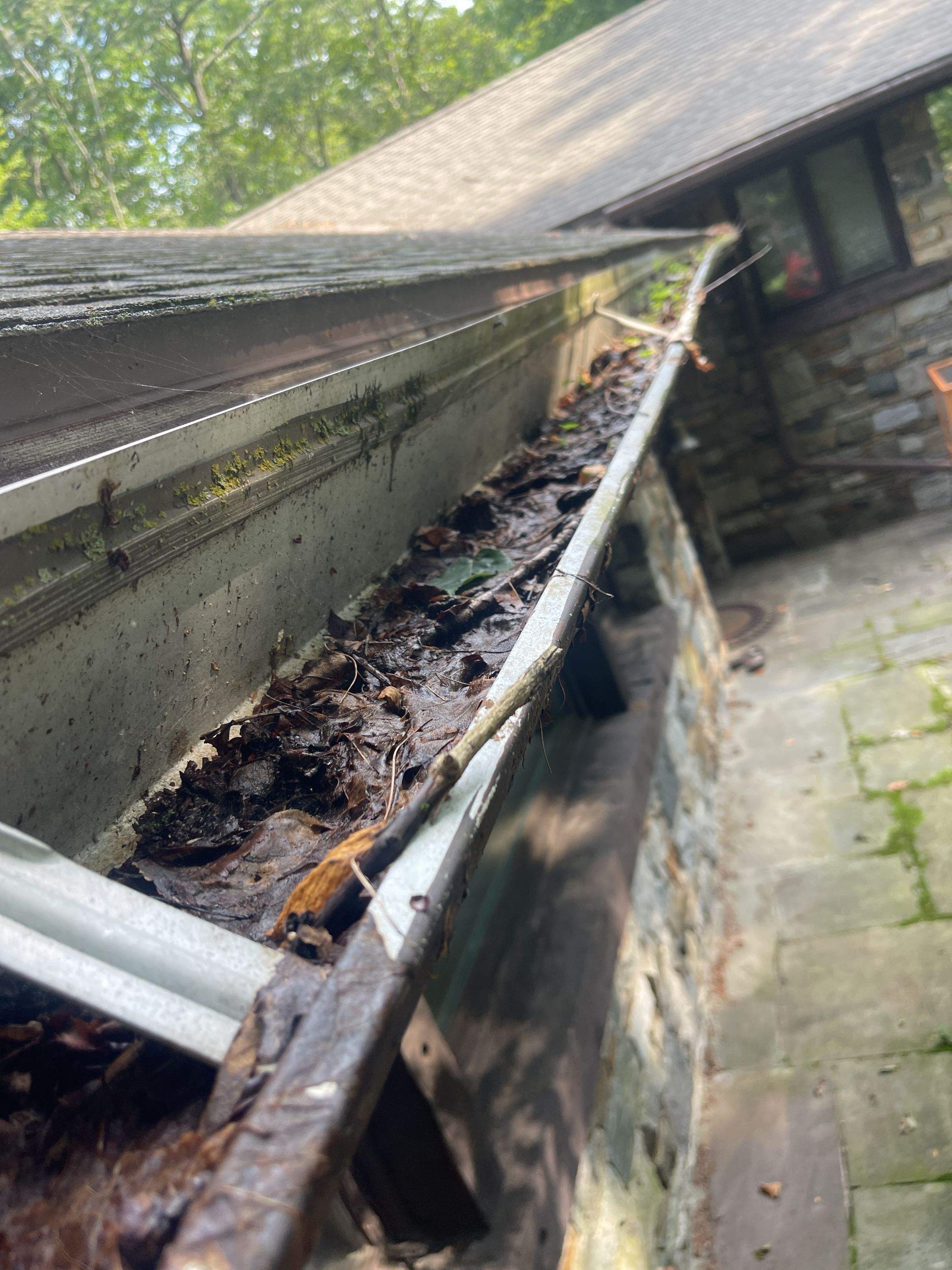 Gutter Installation using 5k Brown Gutters by A Plus Exterior