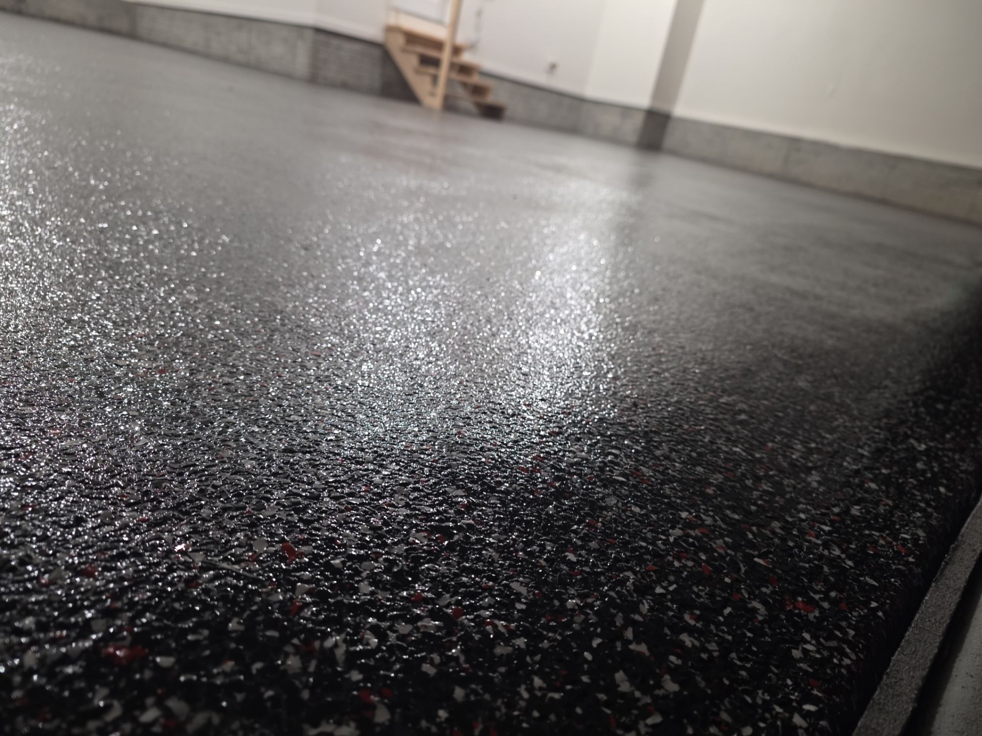 Husker-Style Garage by Revival Concrete Coatings