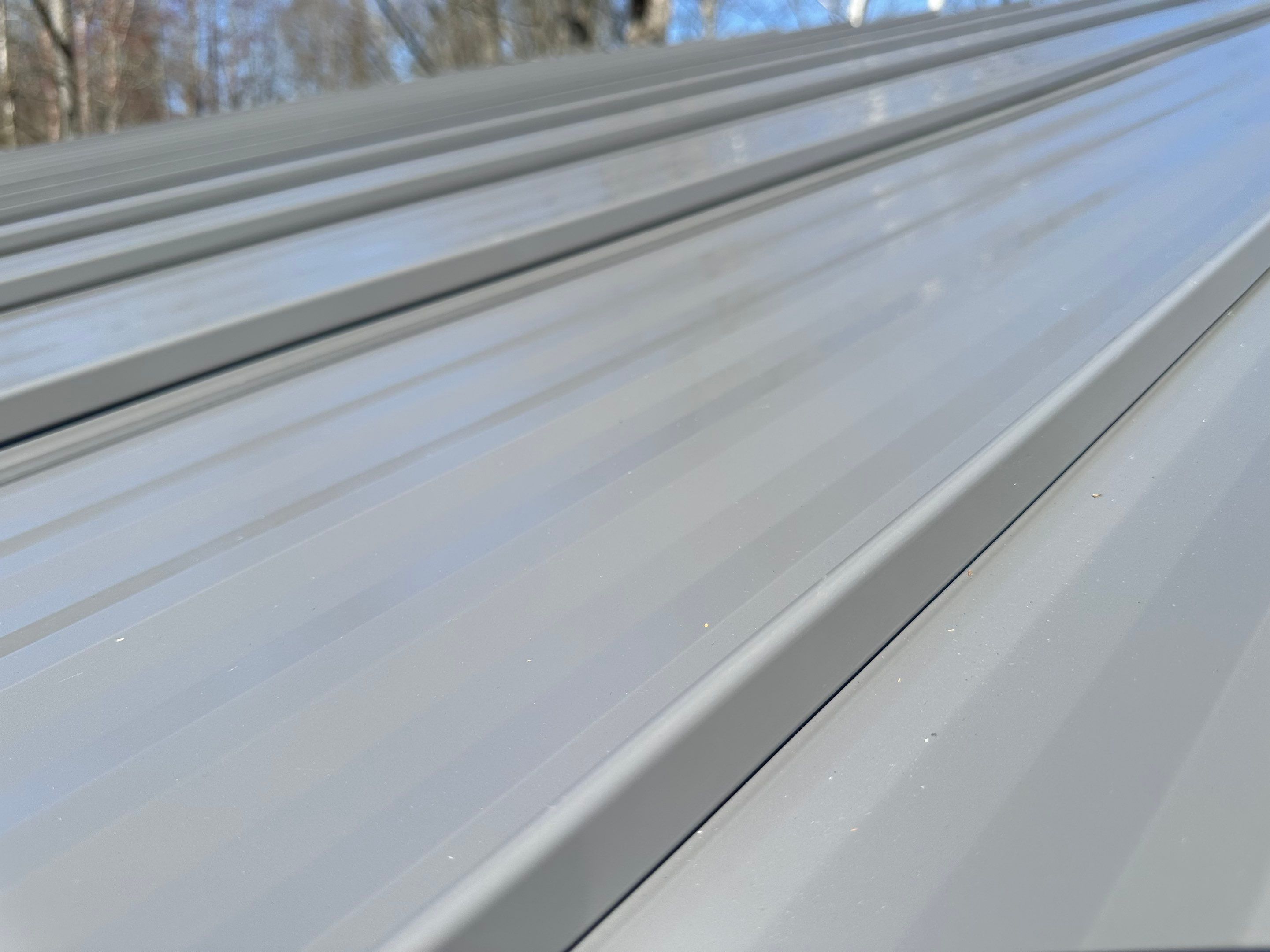 Residential Roofing Installation using Union Corrugatting Metal Roofing by Fahey Roofing + Contracting