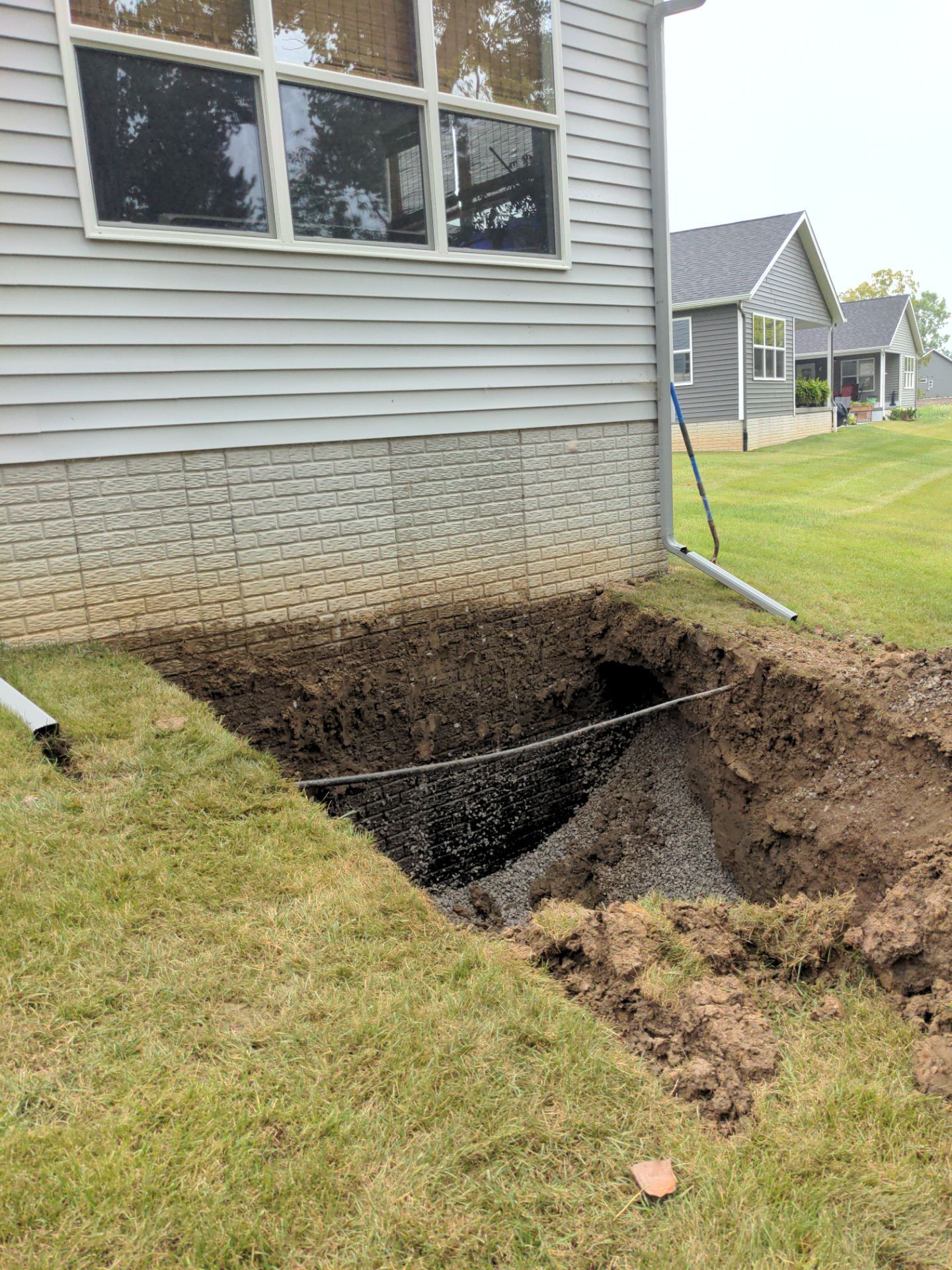 Egress Door Install using Egress Sliding Walk-Out Basement Door by Toledo Basement Repair