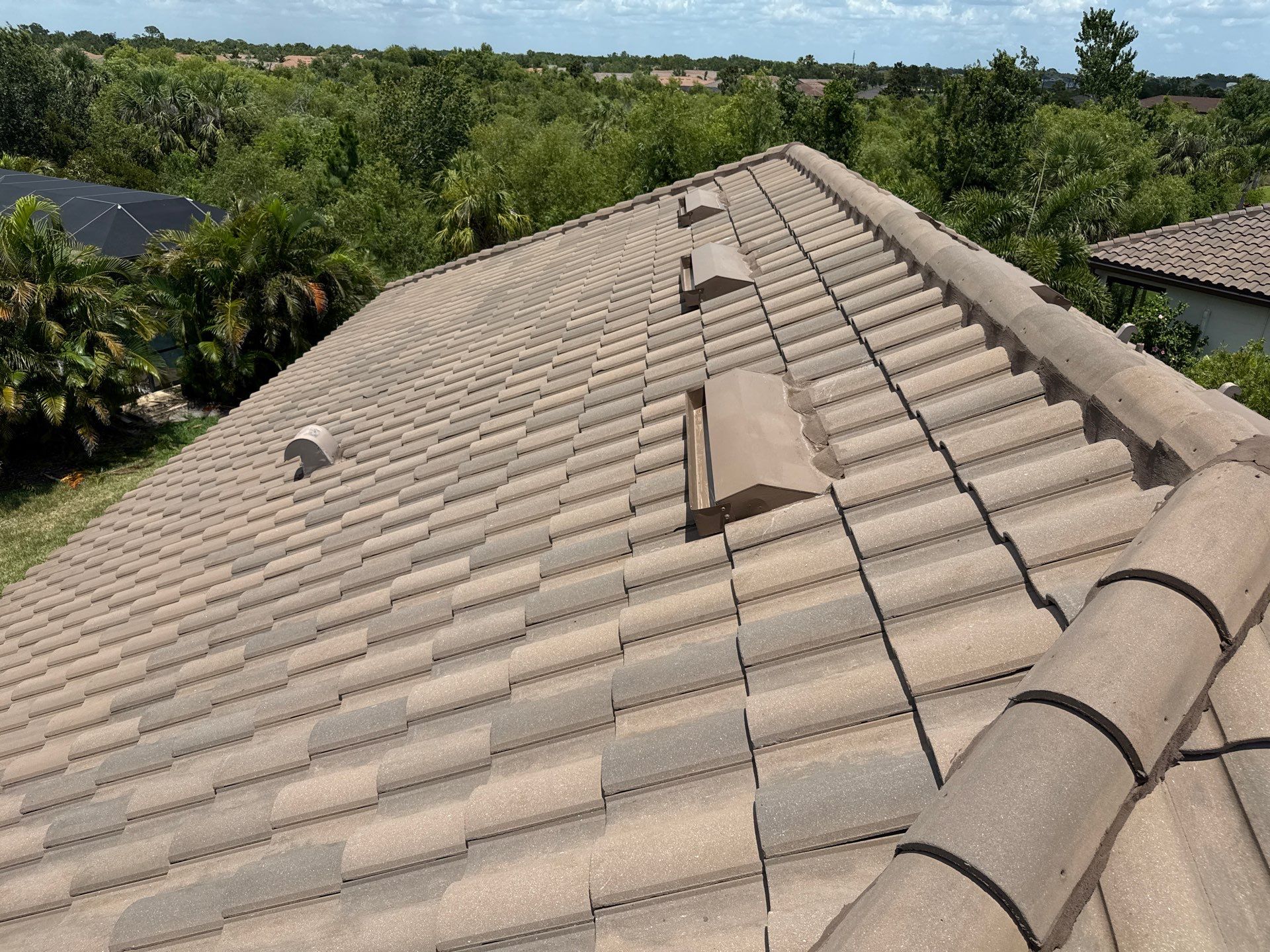 Concrete Tile Roof, Paver Driveway & Lanai Cleaning – Artisan Lakes Esplanade, Palmetto, FL by Sunshine AquaWash