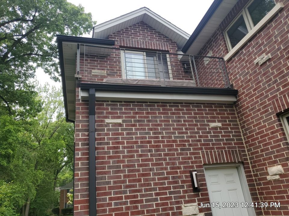 Highland Park, IL Bluestone, concrete,  Trex deck cleaning by Northern Power Washing LLC.