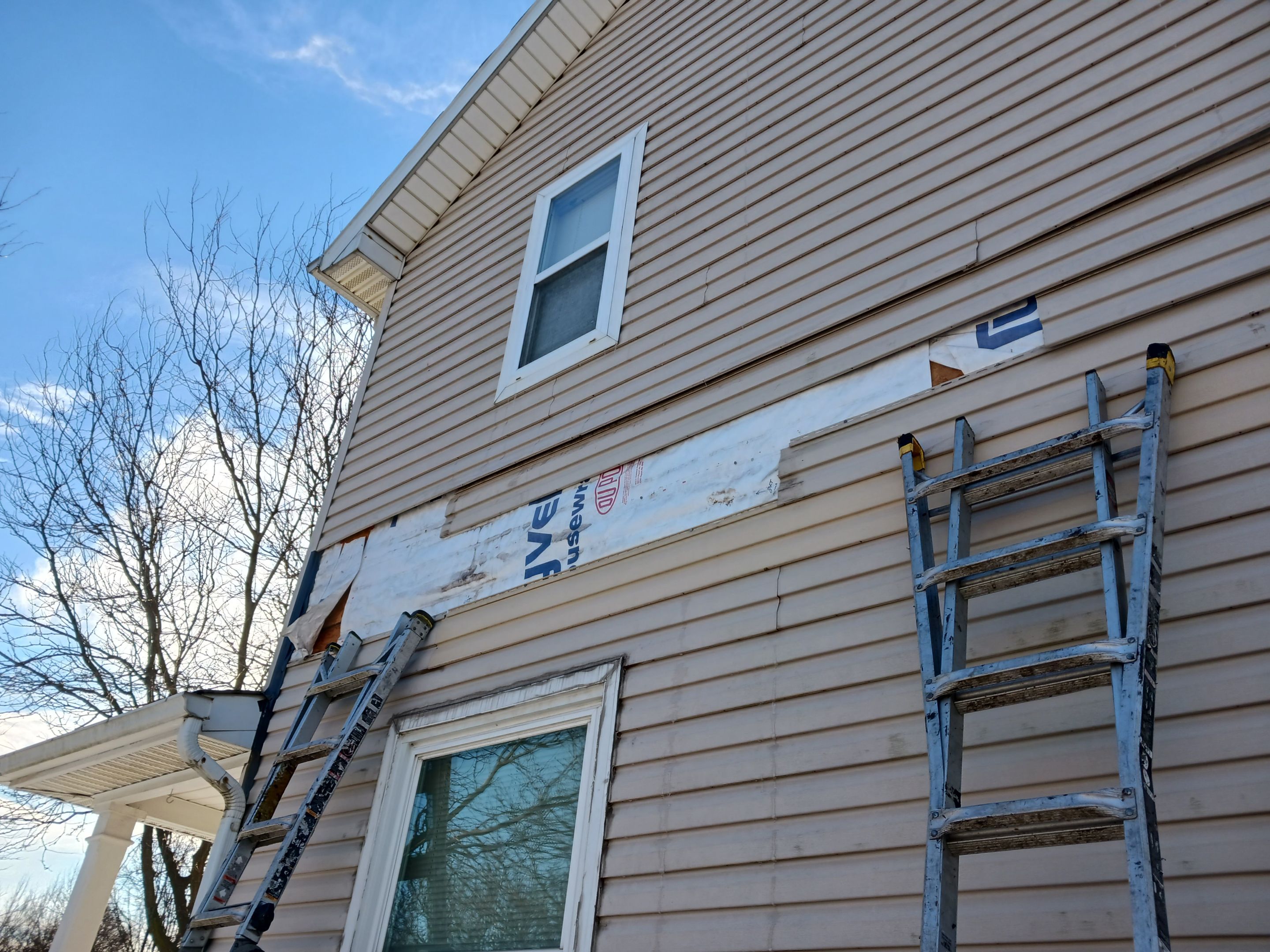 Wind damage to Siding: Insurance paid for full replacement of all siding by Absolute Roofing and Construction