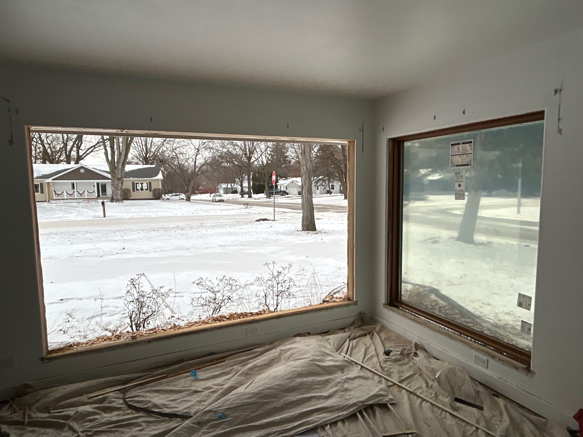 Black-Frame Pella Lifestyle Upgrade on a Partial Brick Home by United Windows and Siding LLC