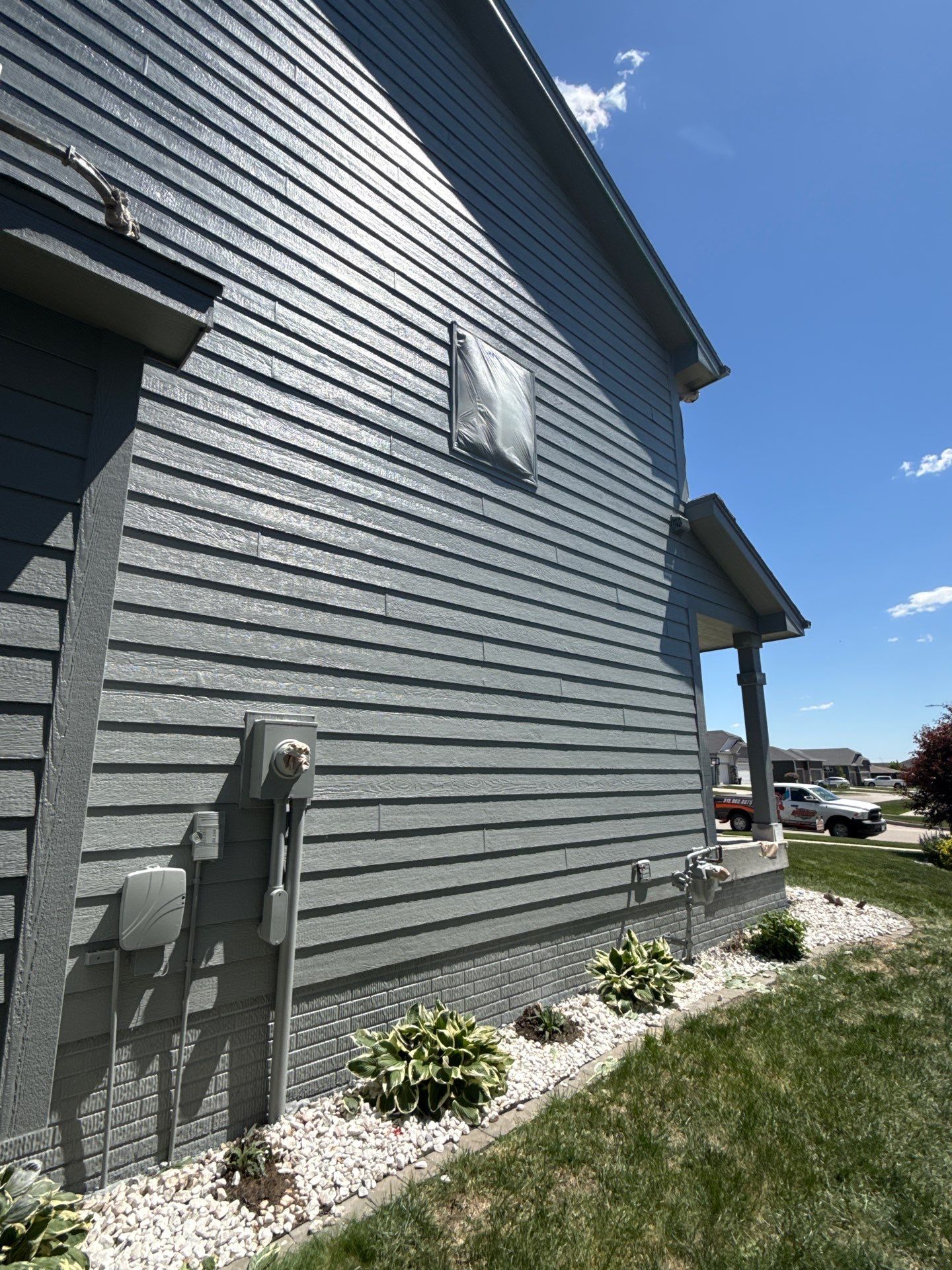 Residential Exterior Repaint in Ankeny by Midwest Paint LLC