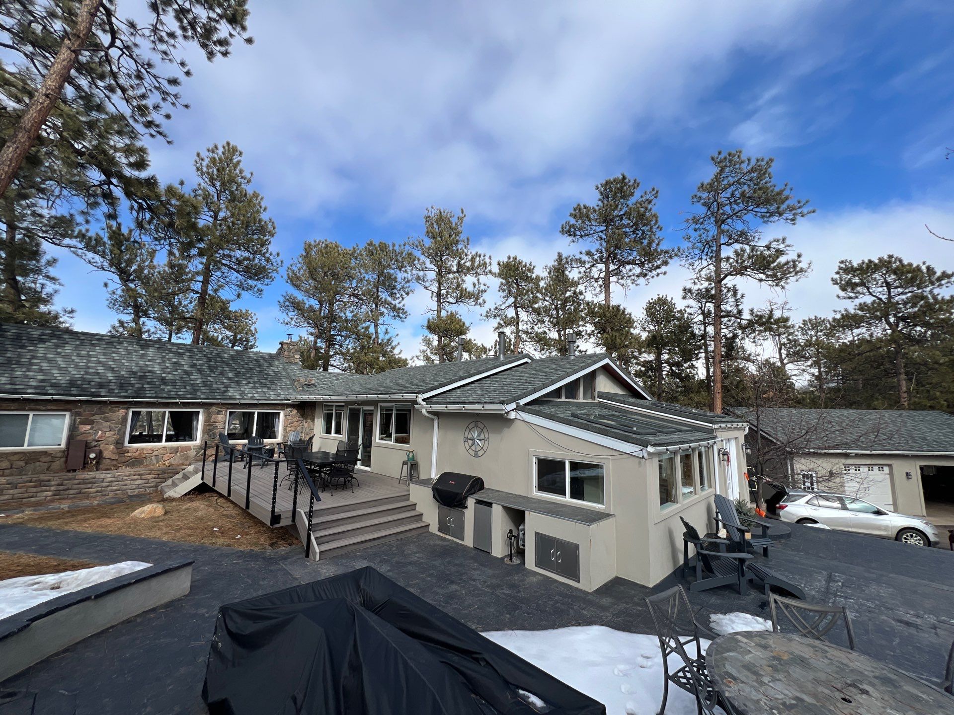 Residential Roofing Installation using Stone Coated Steel by Blue Peaks Roofing LLC 