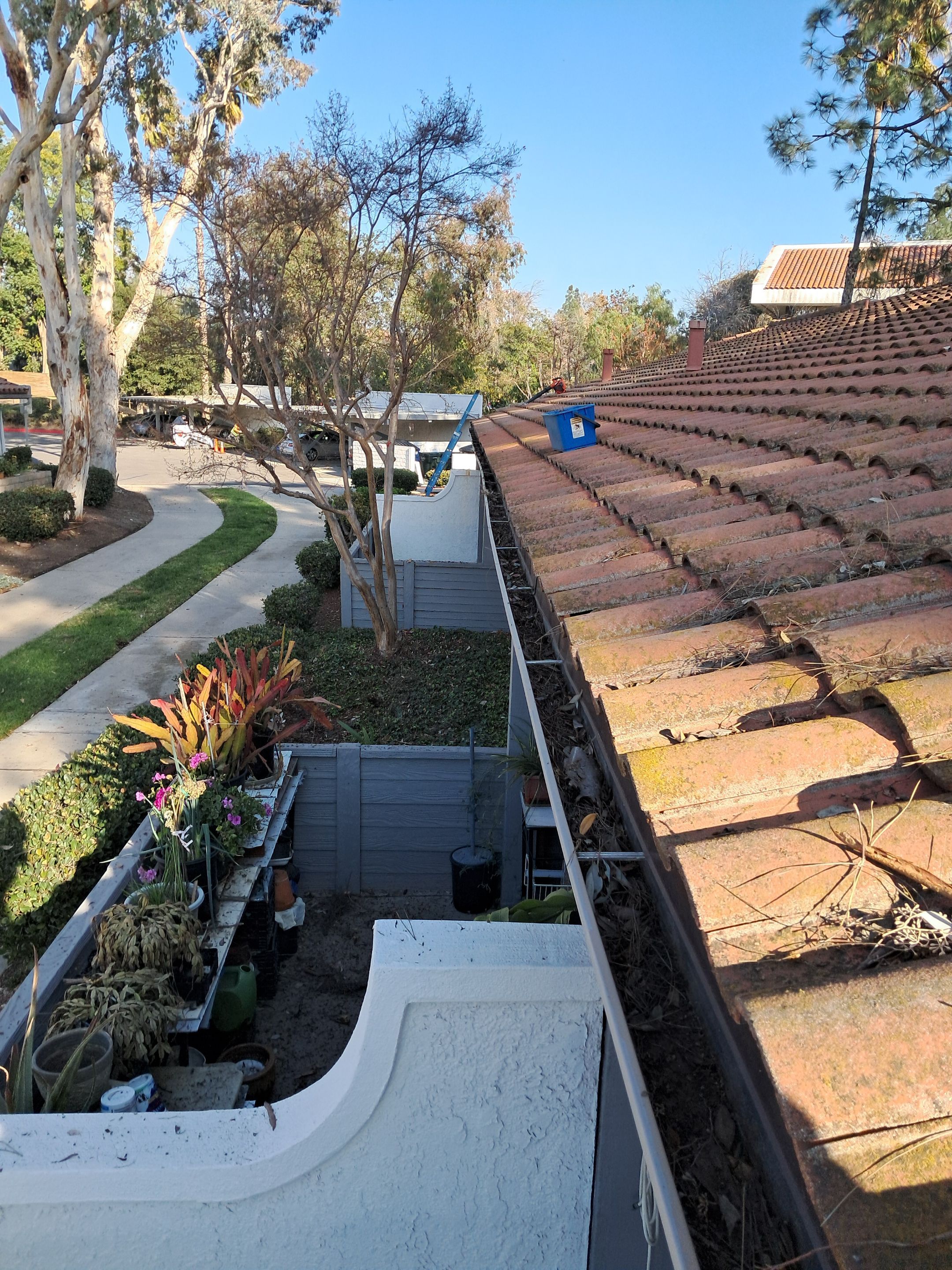 HOA gutter cleaning in Pinehurst & Southern Pines, NC,before  photo showing full gutters.