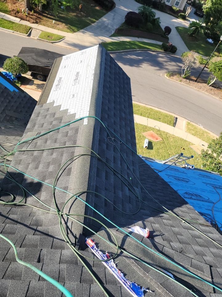 Residential Roofing Installation using Roof Replacement by American Roofing & Construction LLC
