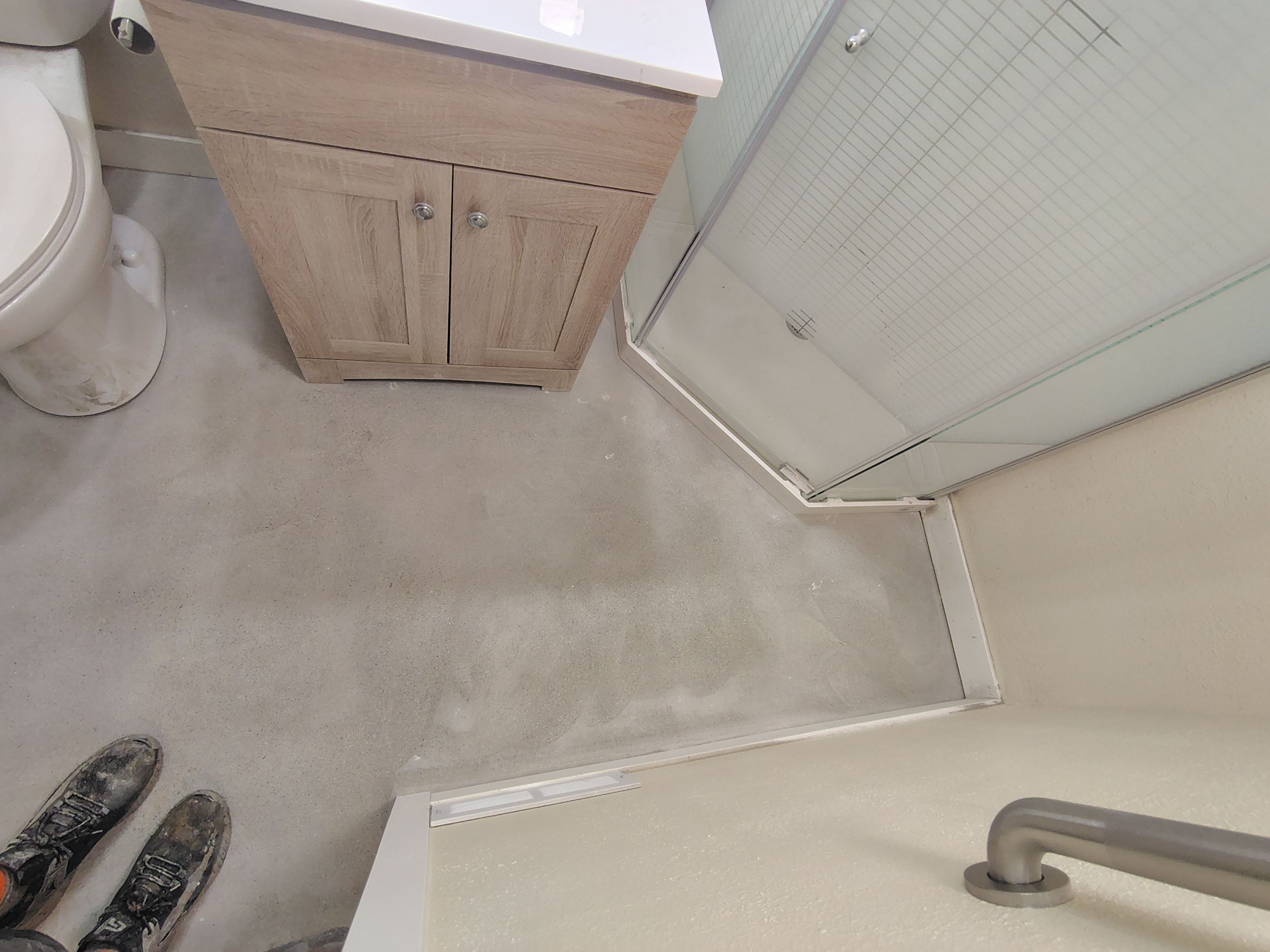 Comprehensive Basement Concrete Floor Coating and Crack Repair in Sioux Falls by Select Painting, Coatings & Garage Cabinets