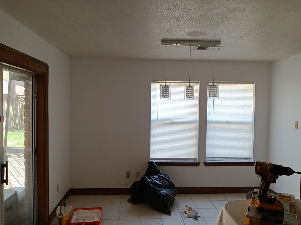 Interior and exterior painting project by Roof Concepts Construction
