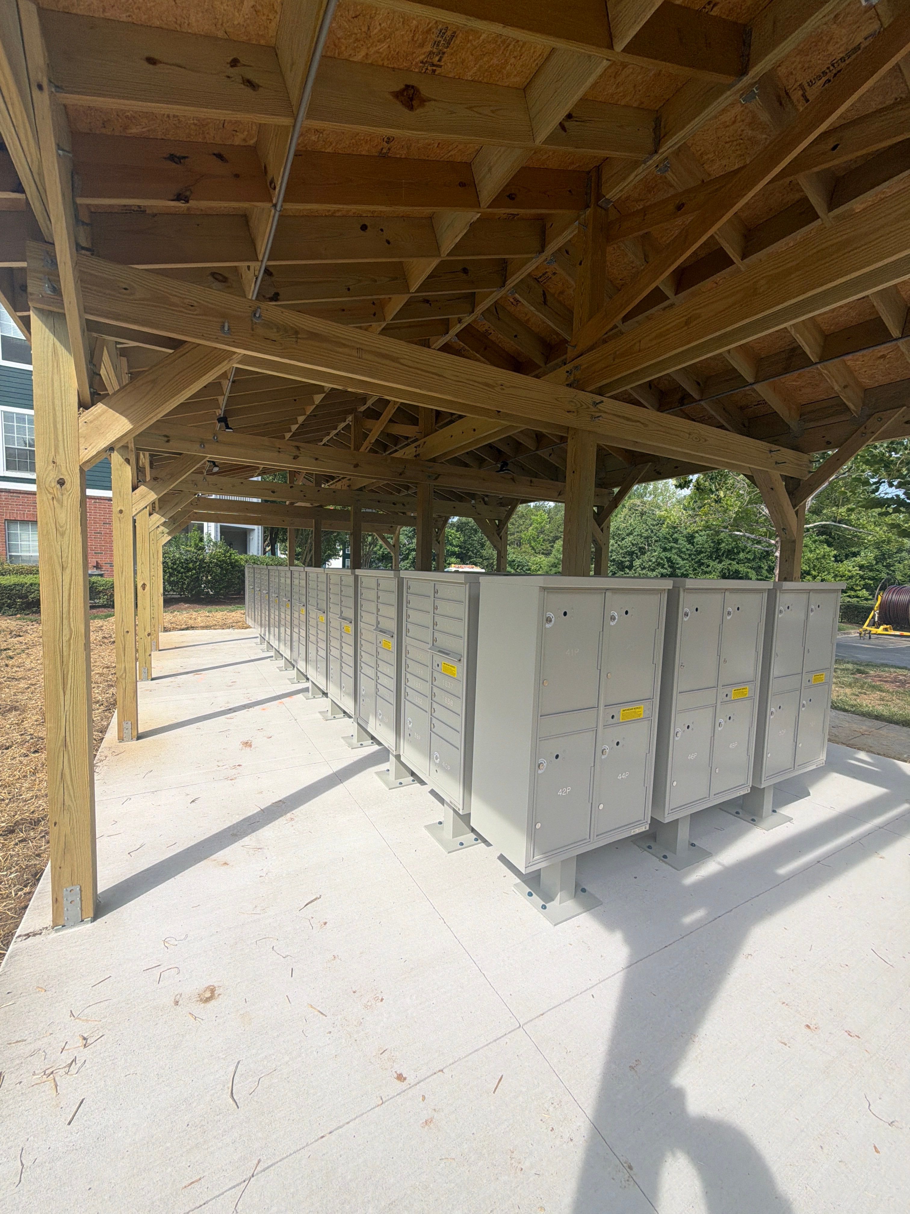 Custom Timber Frame Pavilion for Cluster Mailbox Units in Raleigh by Billy Weatherspoon Contractor