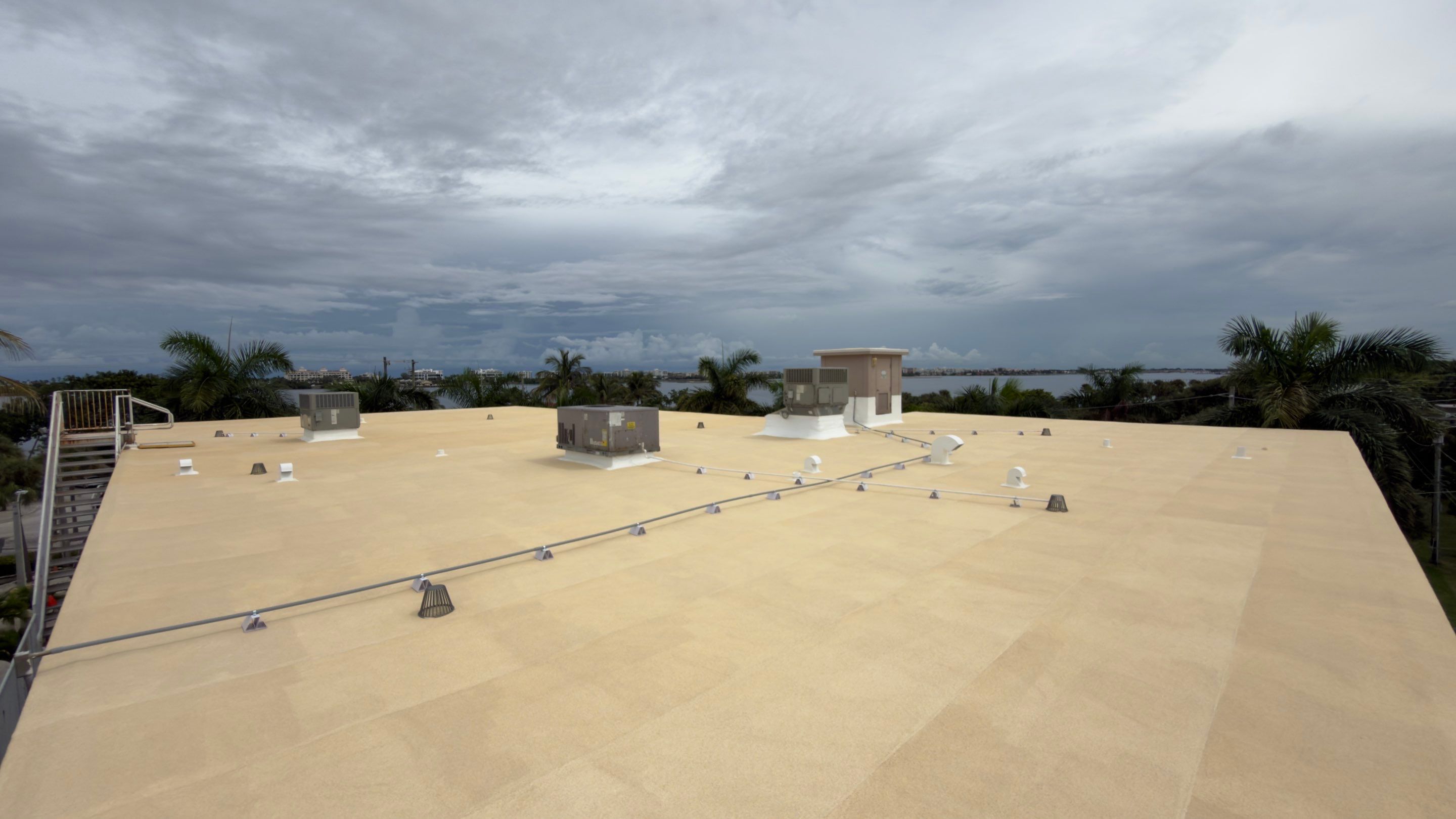 Commercial Roof Restoration for Lake Worth Beach Flat Roof Project by Roof King LLC