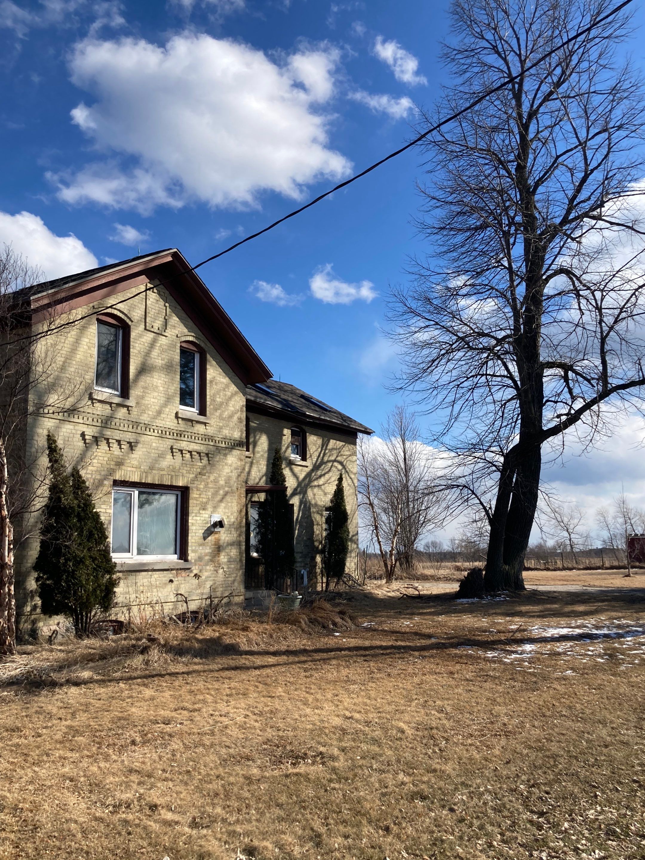  Metal Roof Installation on Residential Brick Home in Oostburg, WI by Gellings Roofing & Siding
