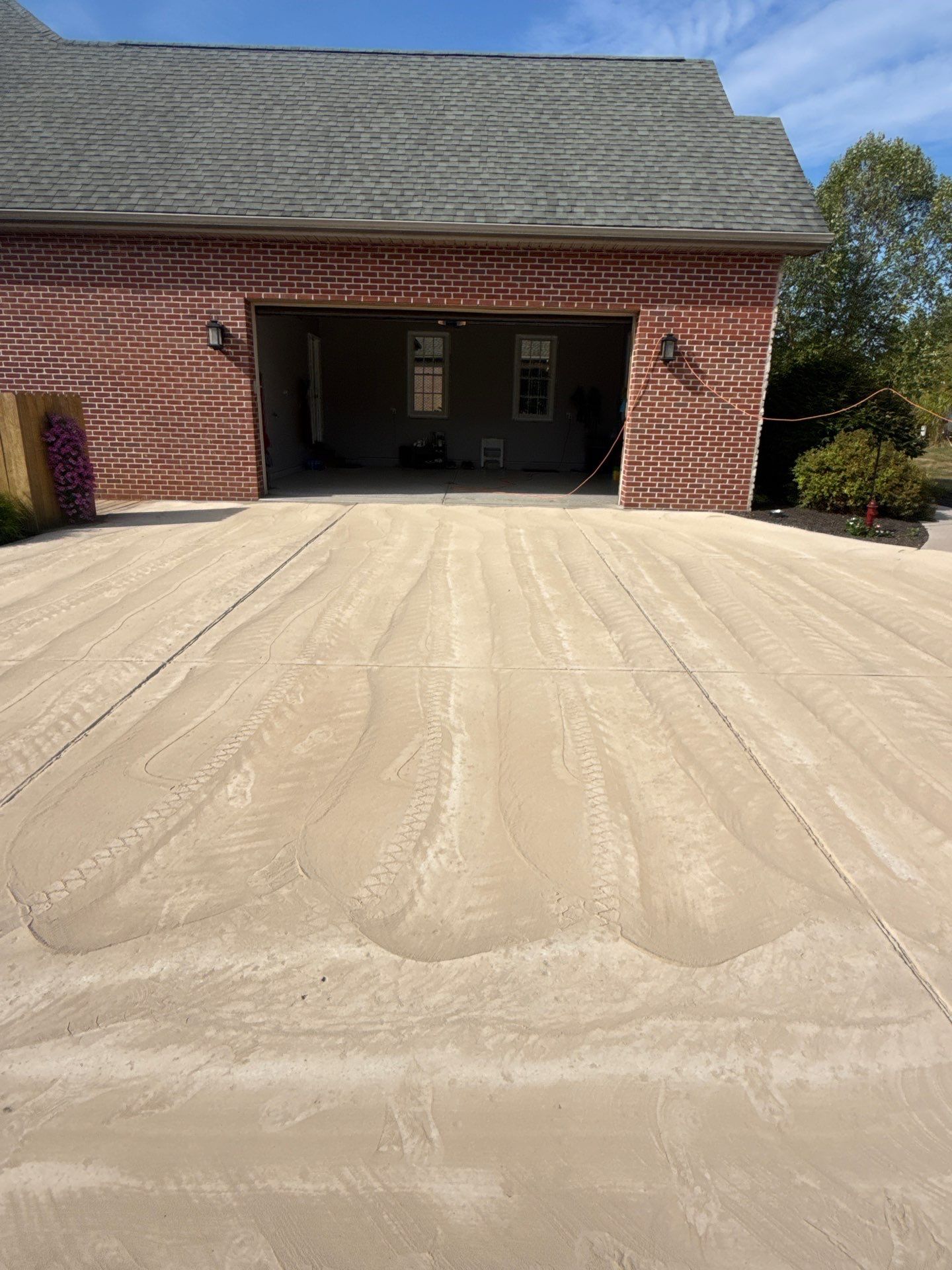 Driveway + Garage + Walkway Project in Meridian by Floors in a Day, Inc