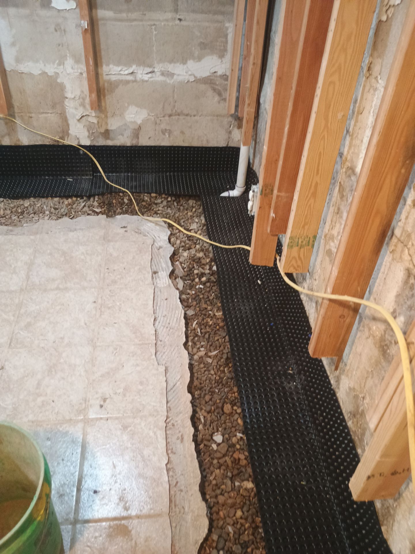 Drain Tile in Minneapolis for Kristen & Taylor by Waterproofing Northeast