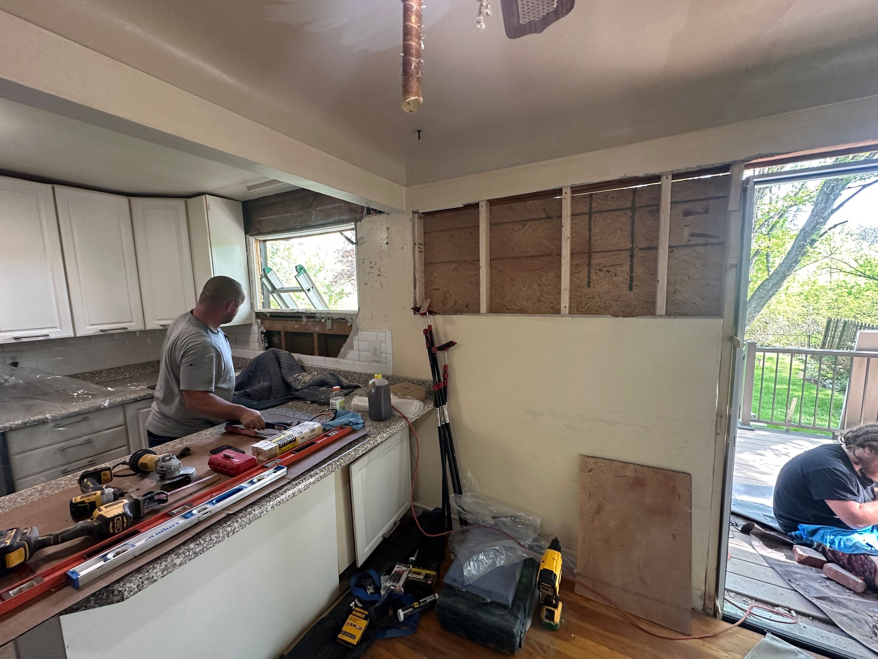 Deck and door install by Cousins Roofing Siding & Decks