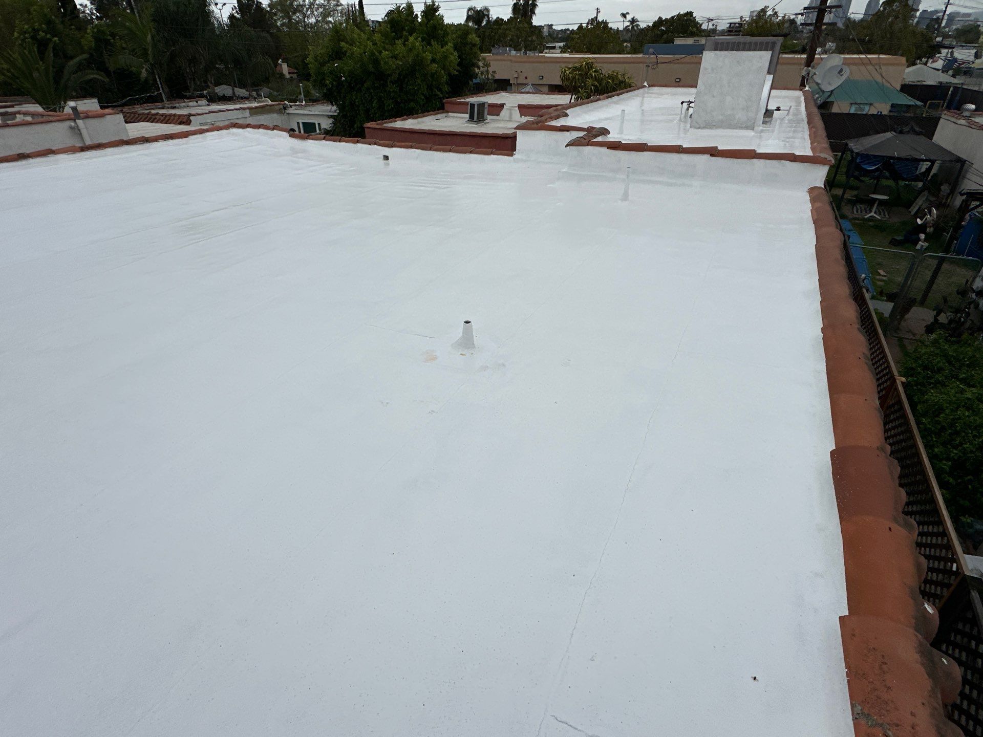 Residential Tile Maintenance and Silicone Application using American Standard Coatings Silicone-S by Hull Brothers Roofing