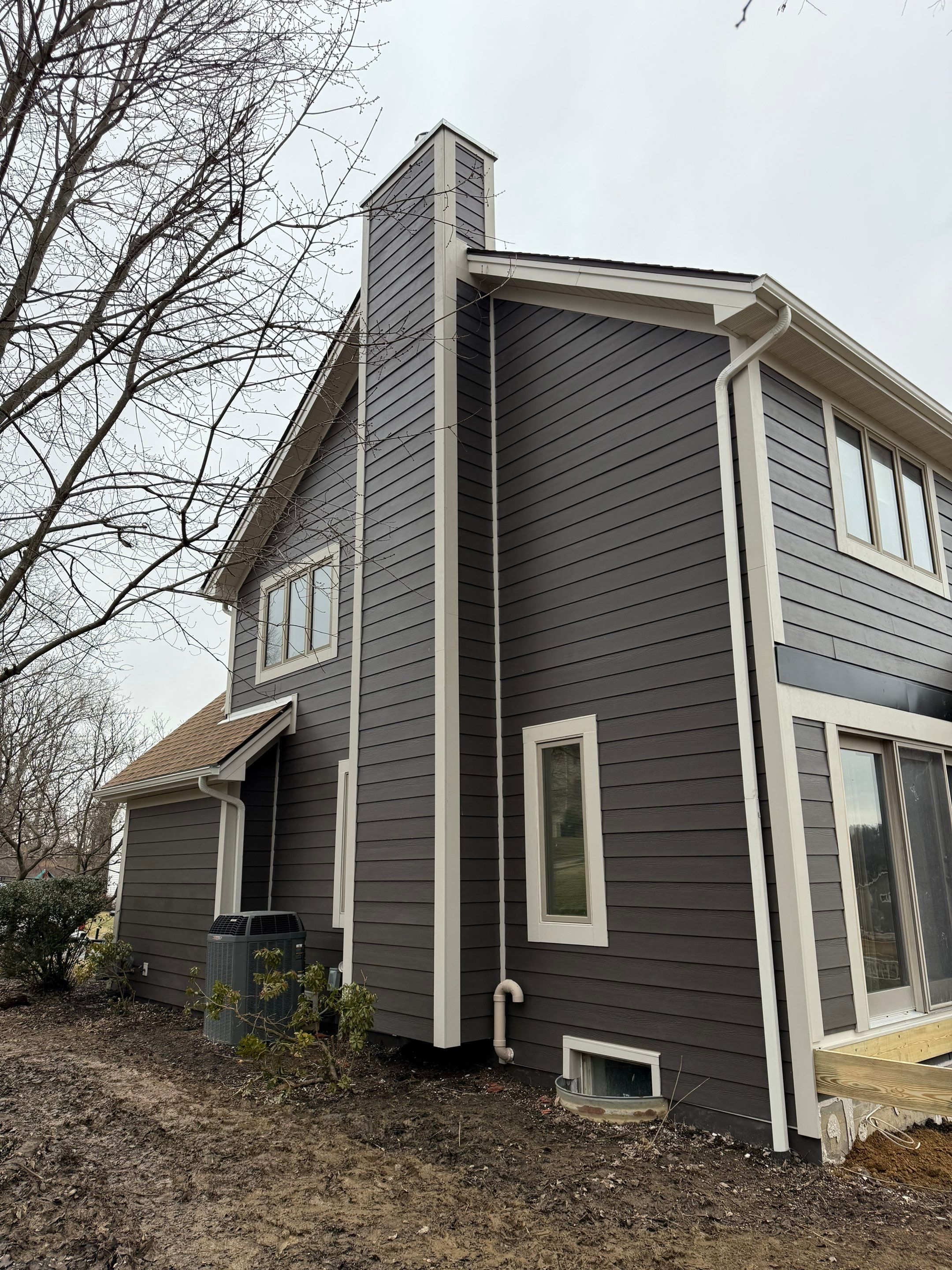 Full exterior remodel by Cousins Roofing Siding & Decks