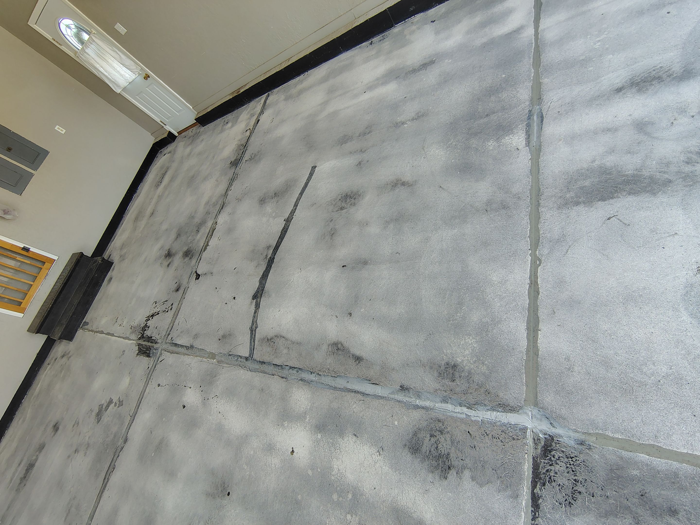 Garage Concrete Floor Coating and Crack Repair in Onawa by Select Painting, Coatings & Garage Cabinets