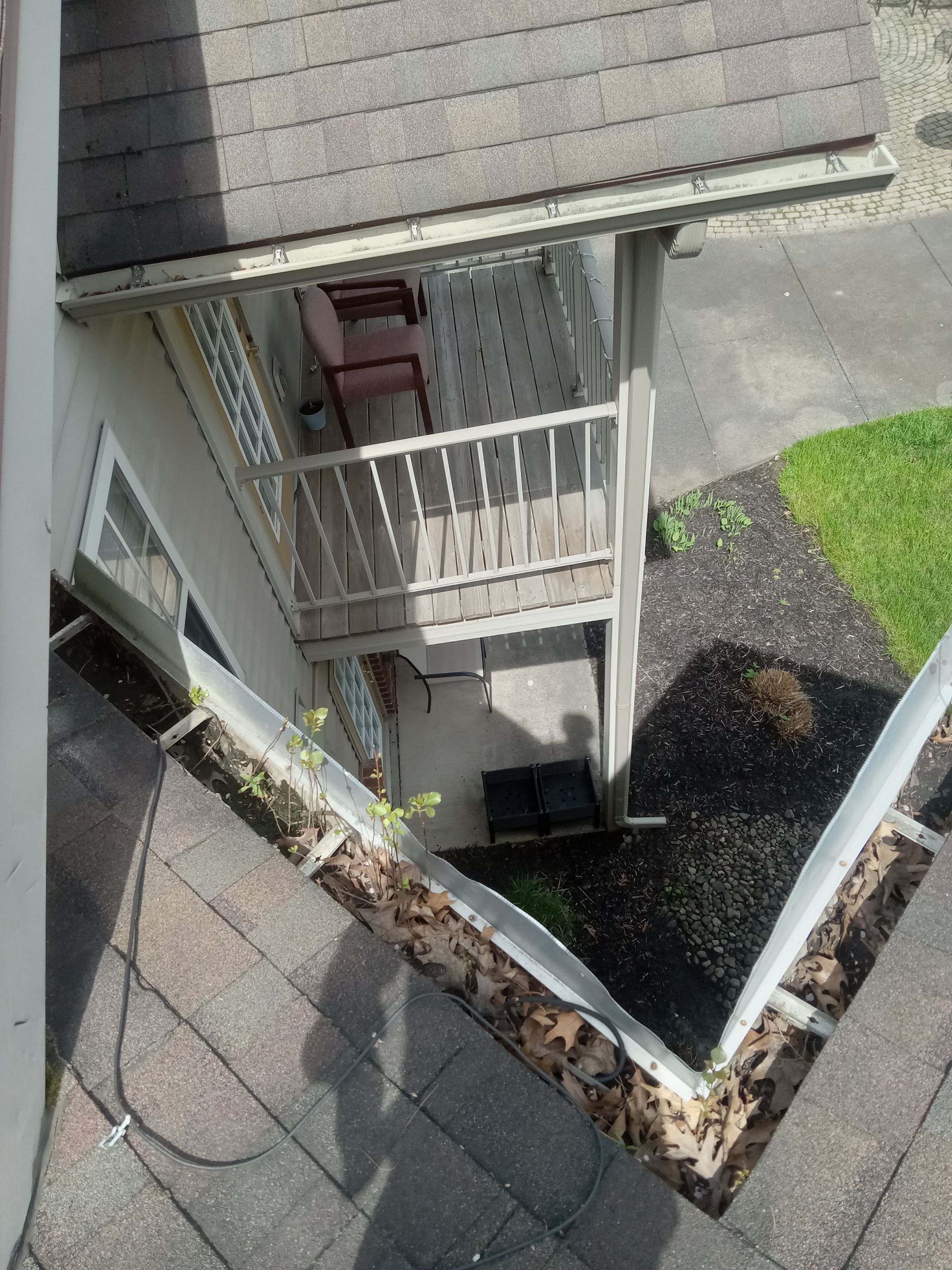 Commercial gutter cleaning Avon, NY before photo with filled gutters