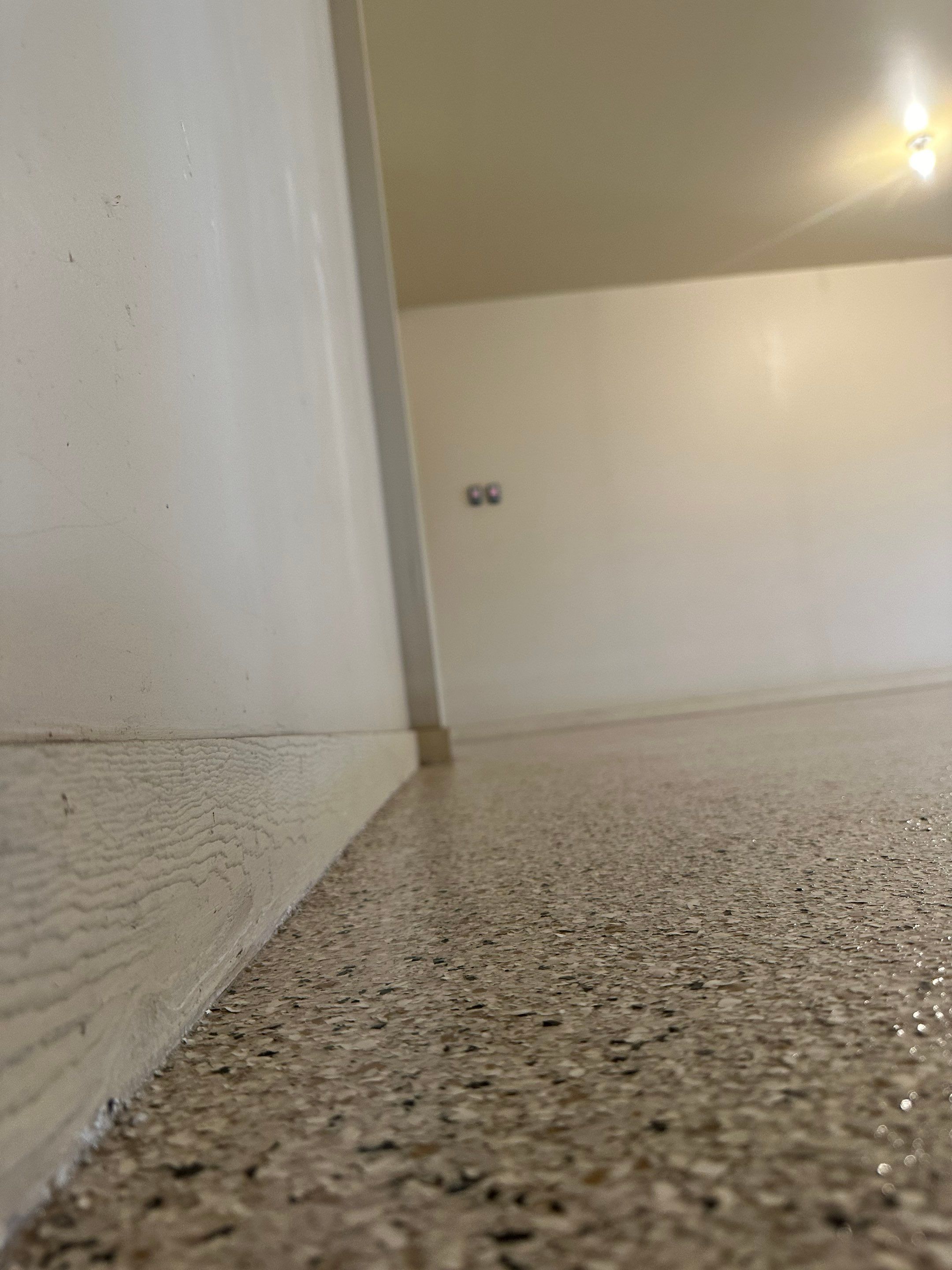 Sioux Falls Garage Floor Concrete Coating with Shoreline Flake Finish by Select Painting, Coatings & Garage Cabinets