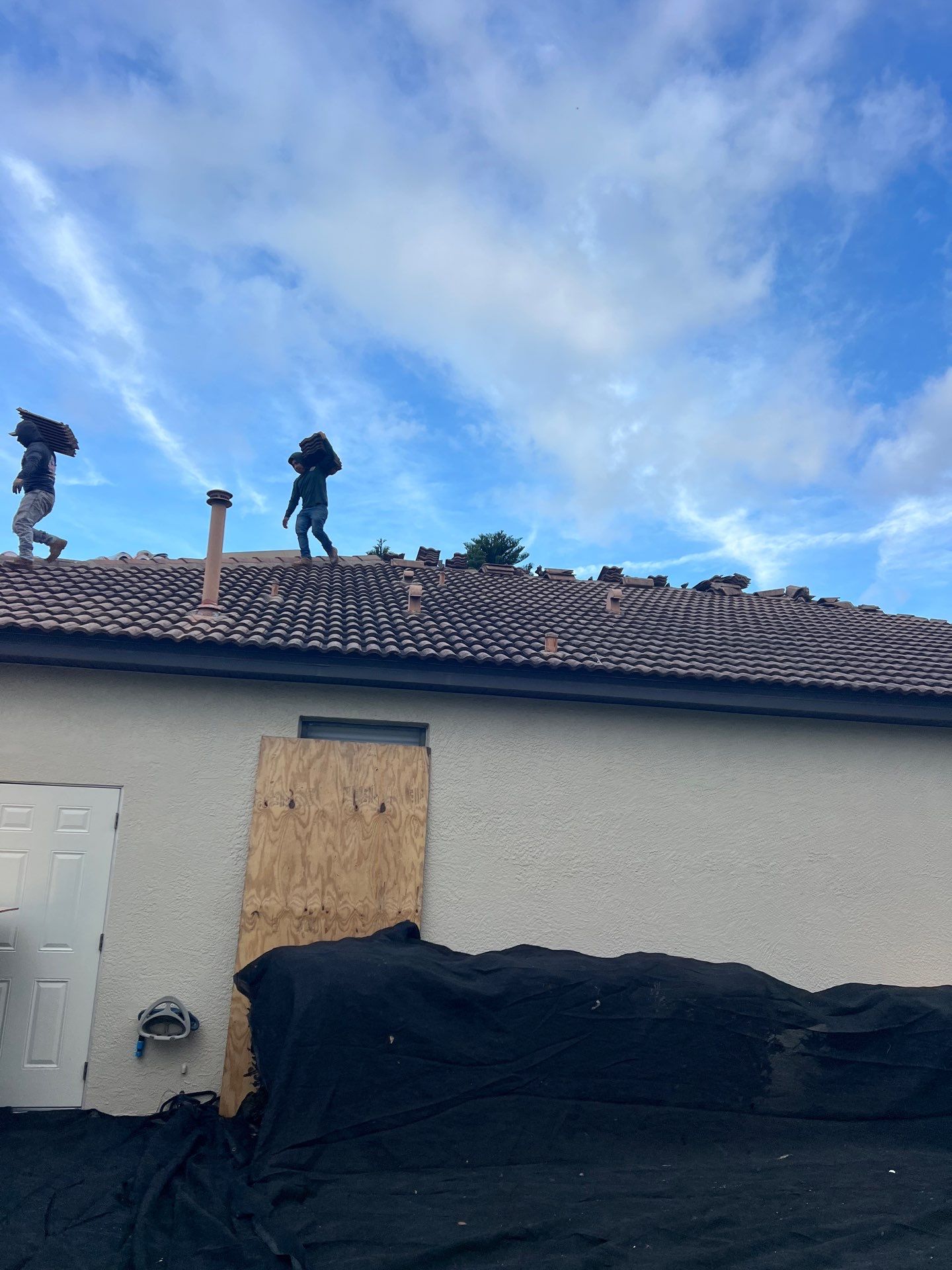 In Progress - Residential Tile Roofing Installation at Lakeridge Falls using tiles from Eagle Roofing Products! by Gopher Roofing