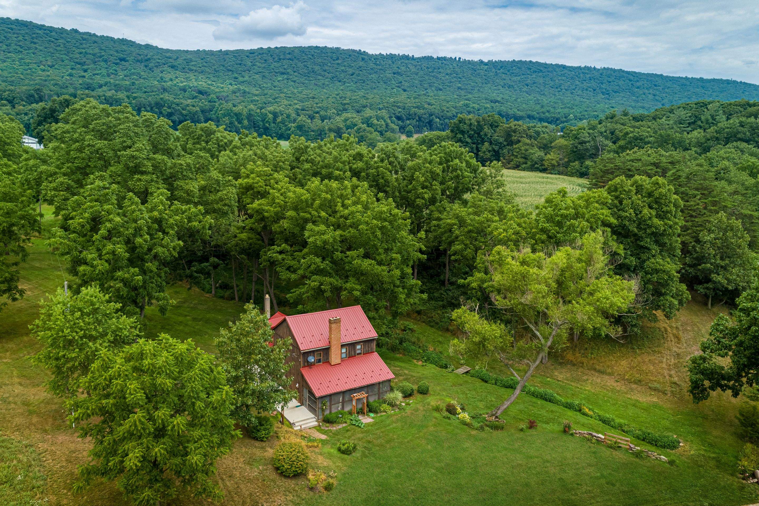 Metal Roof-colonial red by Esh Builders