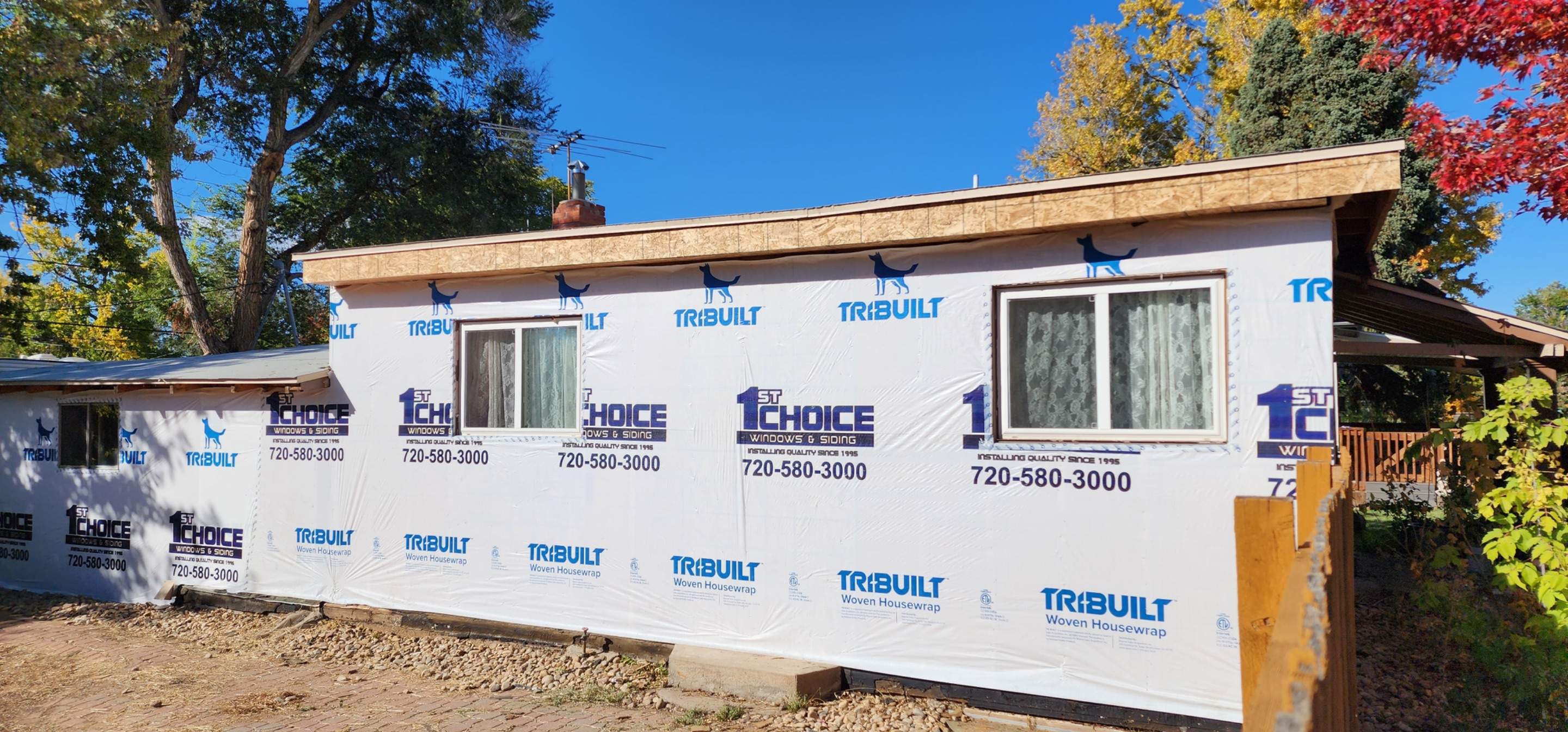 Beautiful little home in Denver receiving Lp Smartside Siding by 1st choice windows and siding