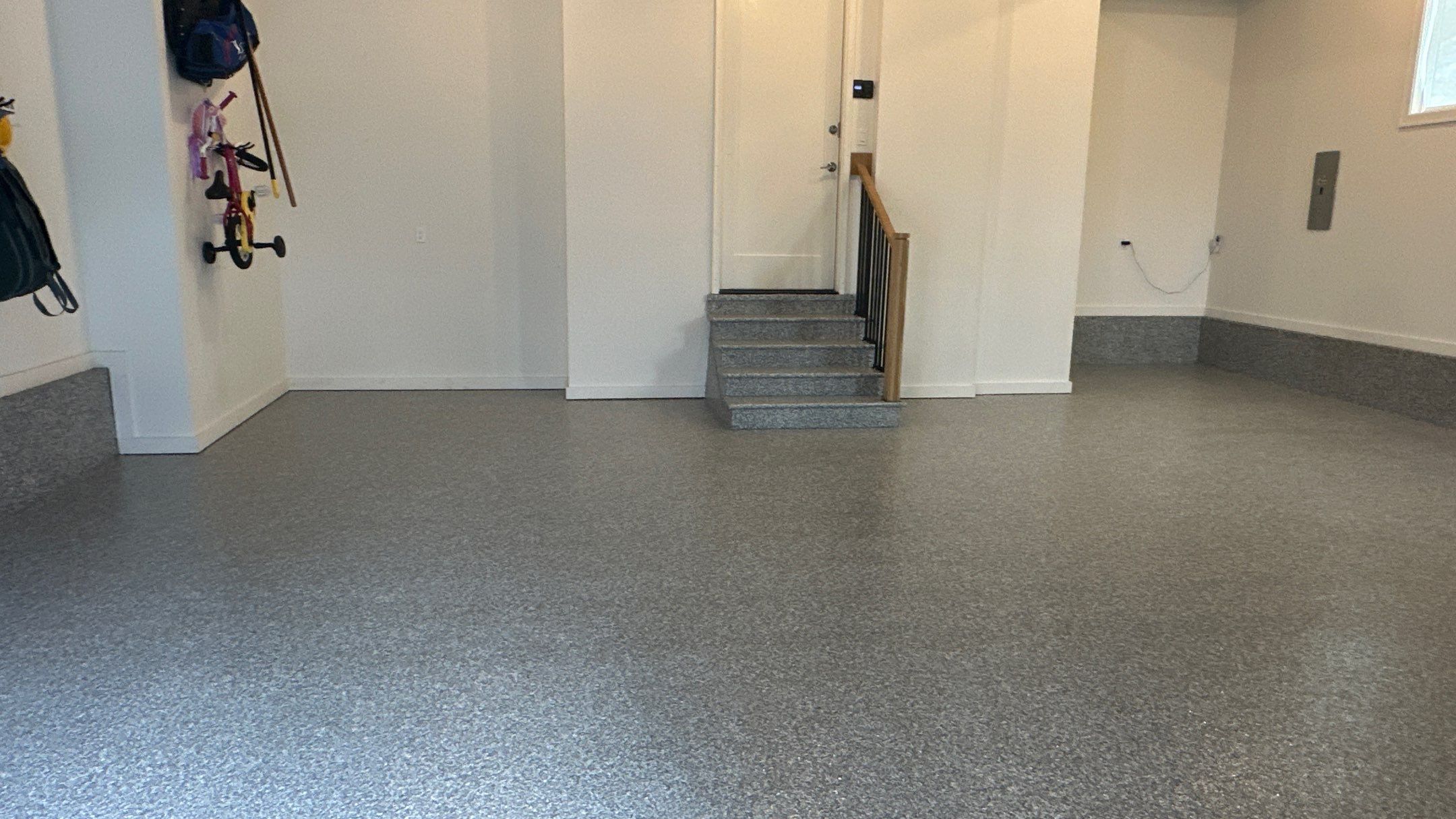 Max R. upgraded his garage with overhead racks and a New floor  by Banner Garage