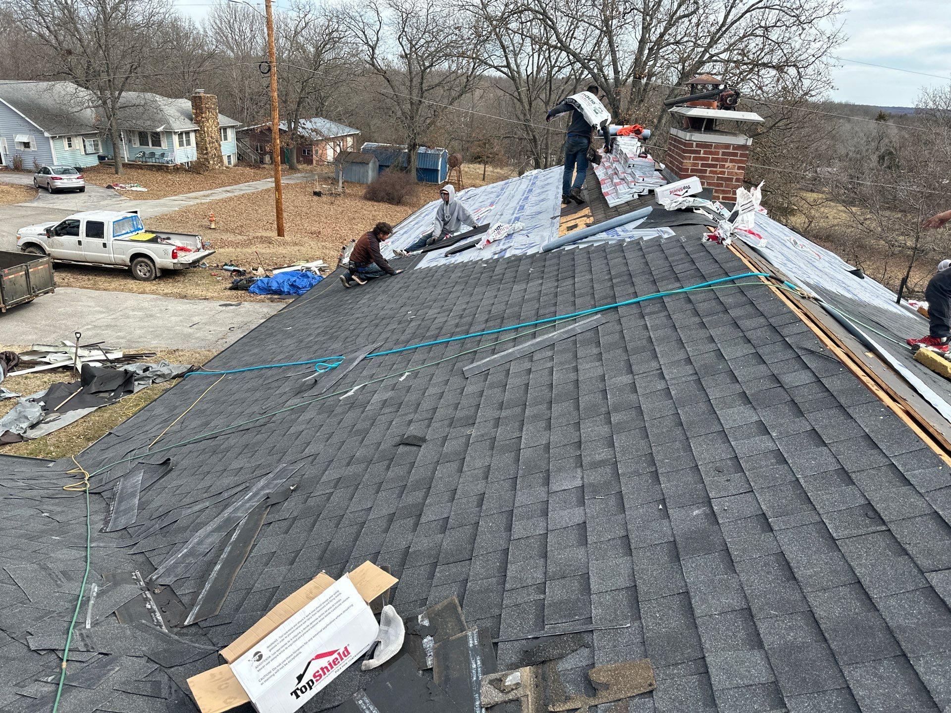 Residential Roof + Gutters & Downspouts & Gutter Guards Install  by Titan Commercial & Residential Roofing 