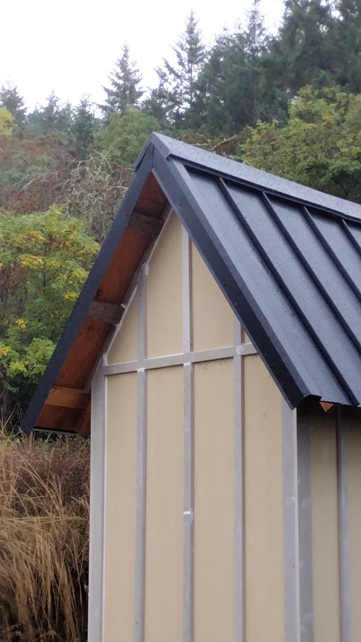 Residential Metal Roof Installation using Taylor Metal Snap Lock Metal Color: Black by Orezona Building & Roofing Company, Inc.
