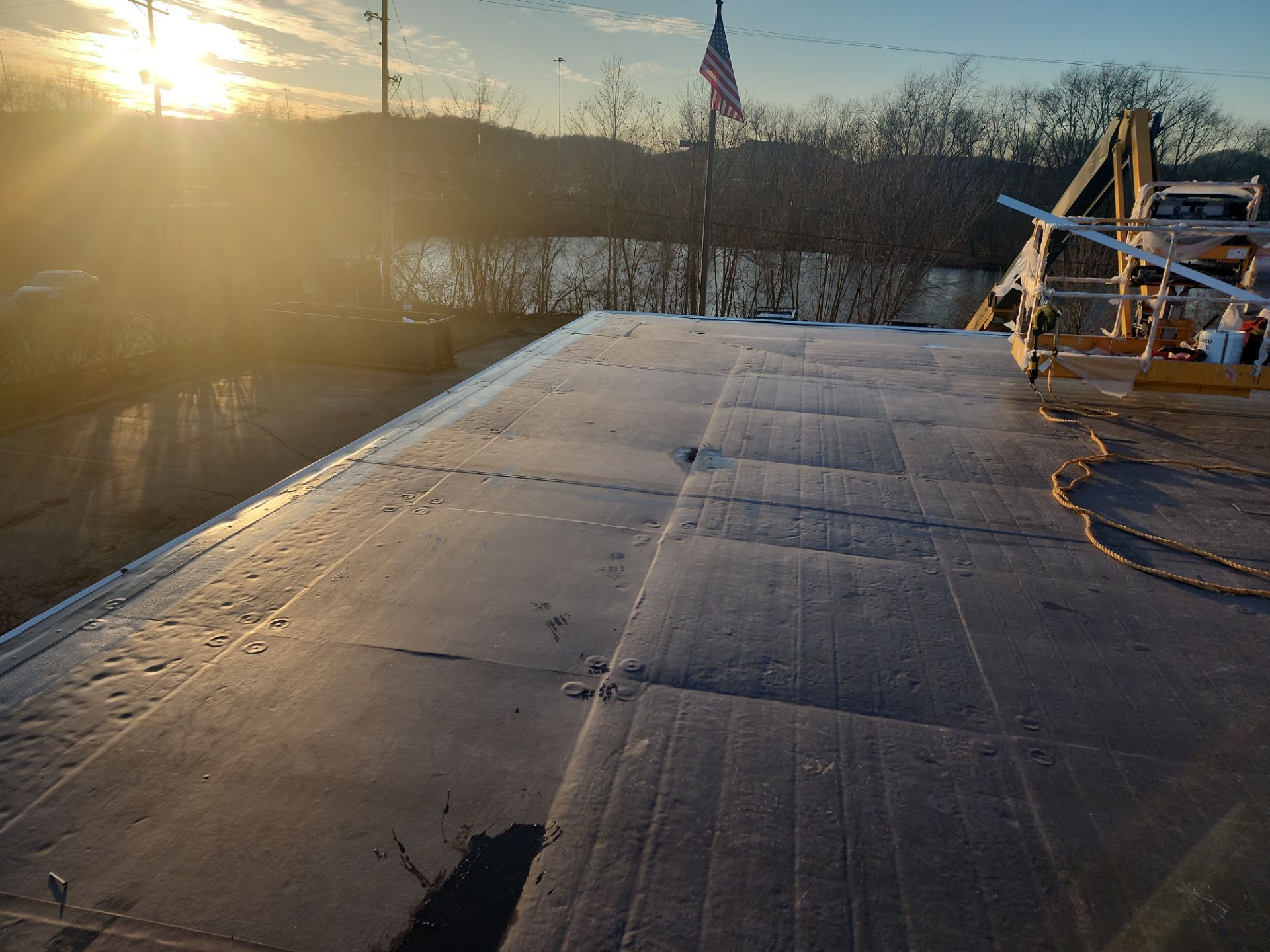 Commercial Roofing Installation using 60 mil rubber roof  by Nitro Roofing and Construction