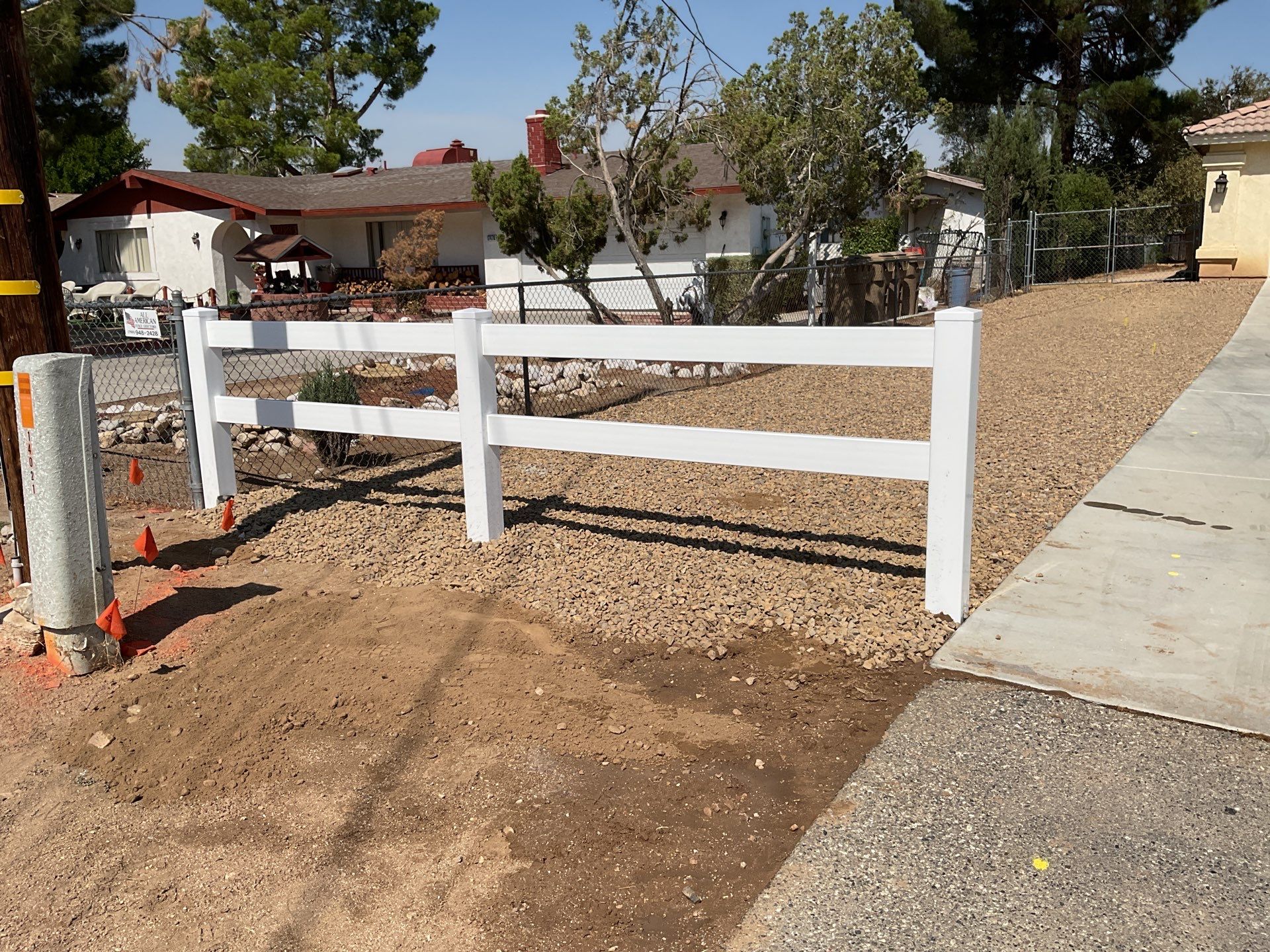 2-Rail Ranch Vinyl Fence  by Fence Guys Inc. 