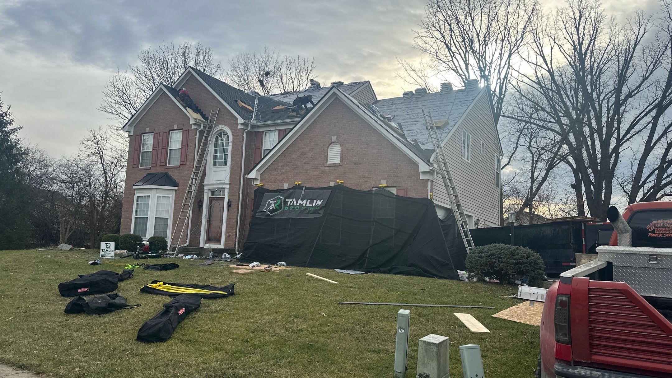 Walden Ponds - Pristine Black and Hydro Flo Gutter Guards by Tamlin Roofing