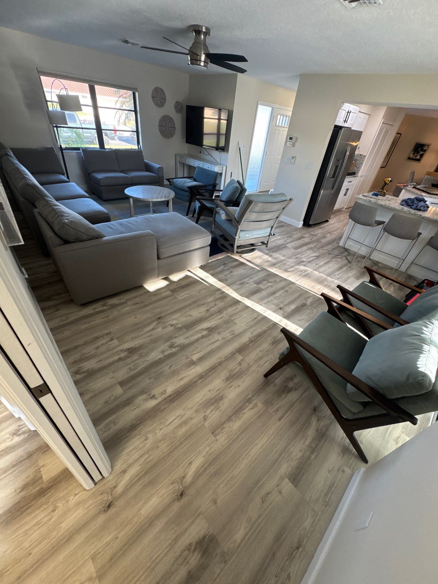 LVP Install in living room/ Kitchen by Vrmmm Flooring