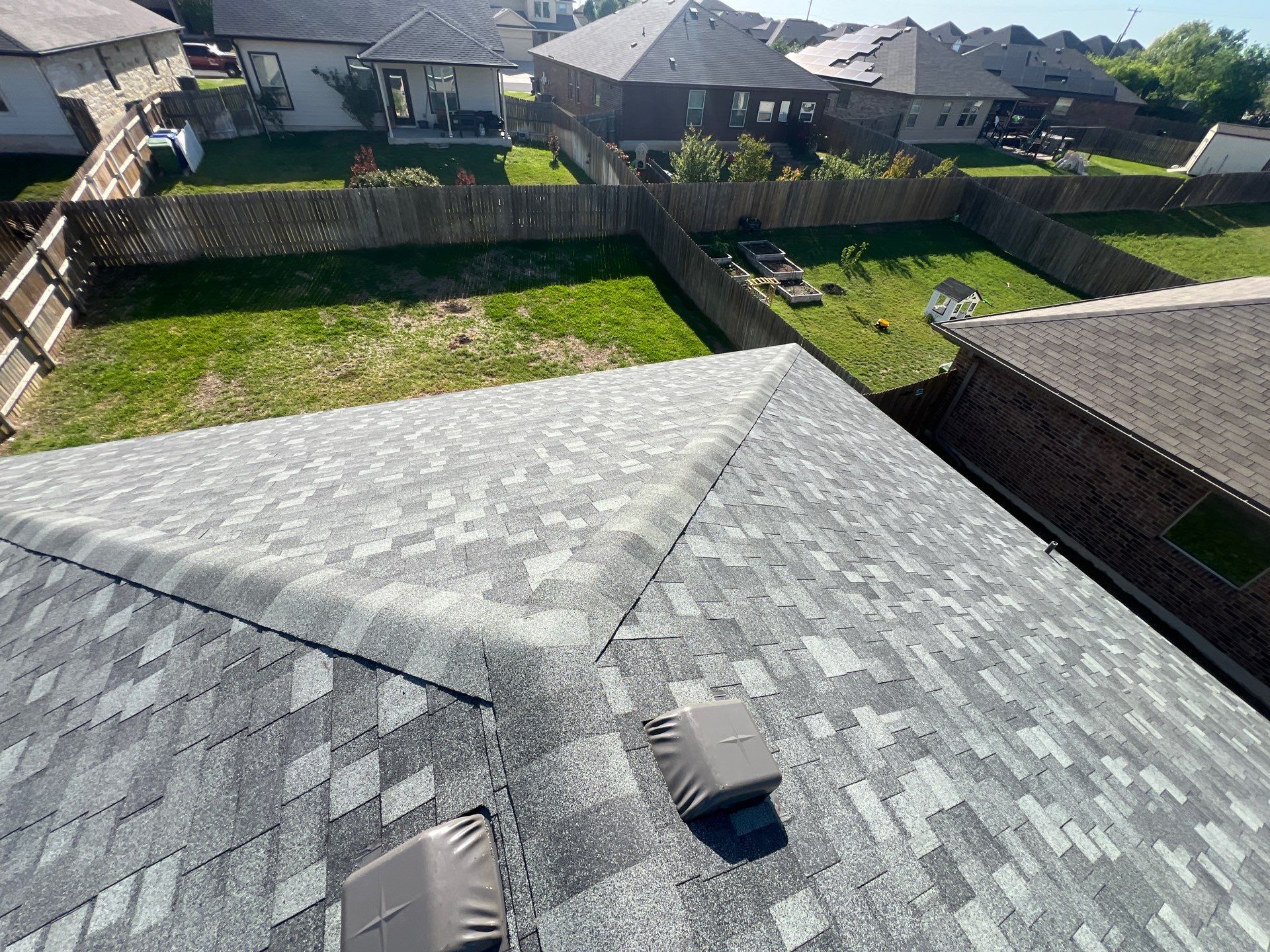 Residential Roofing Installation using IKO Nordic Class 4 Impact Resistant 30yr Architectural Shingles. Color: Castle Grey by WR Roofing Solutions