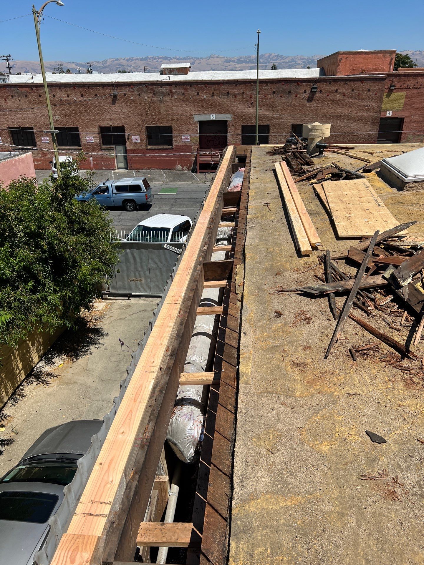 Foam Refurbish using Conklin Benchmark/PUMA XL coatings and spray foam by Straight Edge Roofing Inc