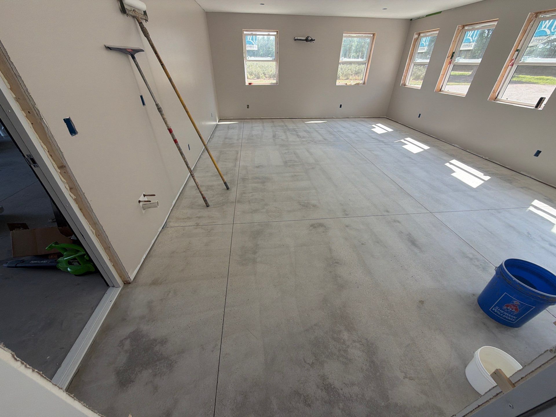 ShoreLine Epoxy Flake Floor Installation for Grand Haven Workshop by Gordon Painting
