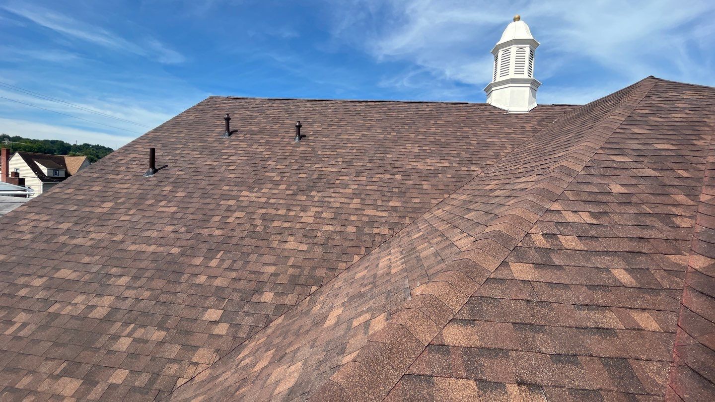 Commercial Roofing Installation using Performance Shingles by Mr. Roofer