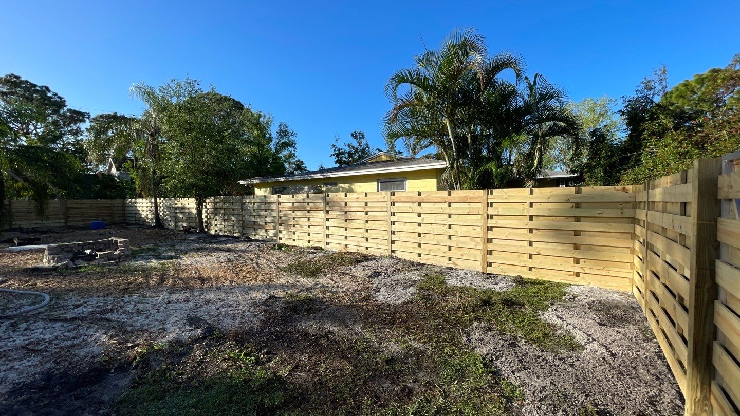 Wood Fence Installation using Horizontal Shadowbox Wood Privacy Fence by Asap fence and gates, LLC