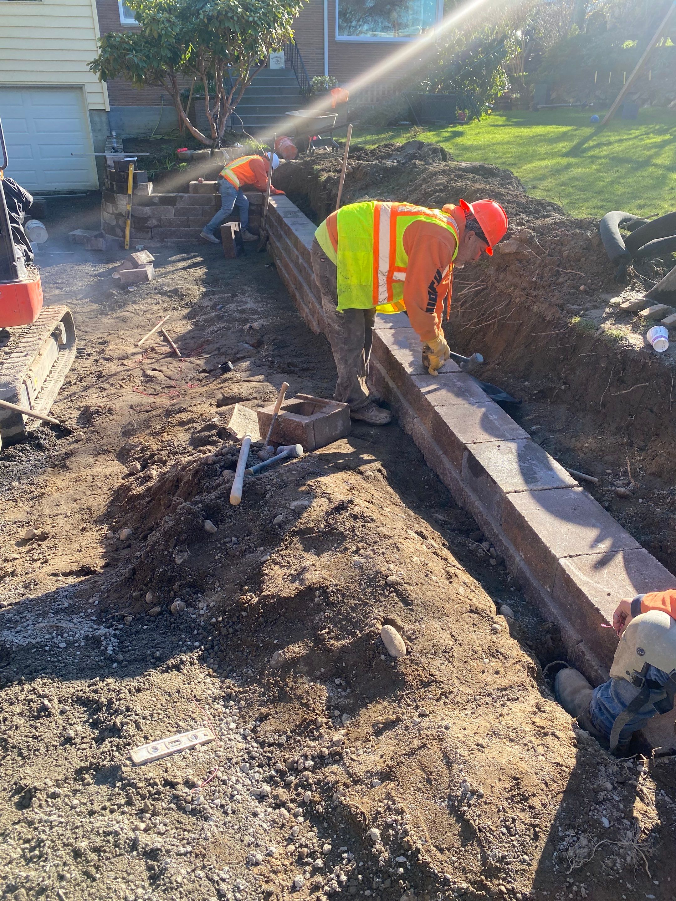 Lorra | Asphalt Driveway Repair & Retaining Wall by Jireh Asphalt & Concrete Inc 