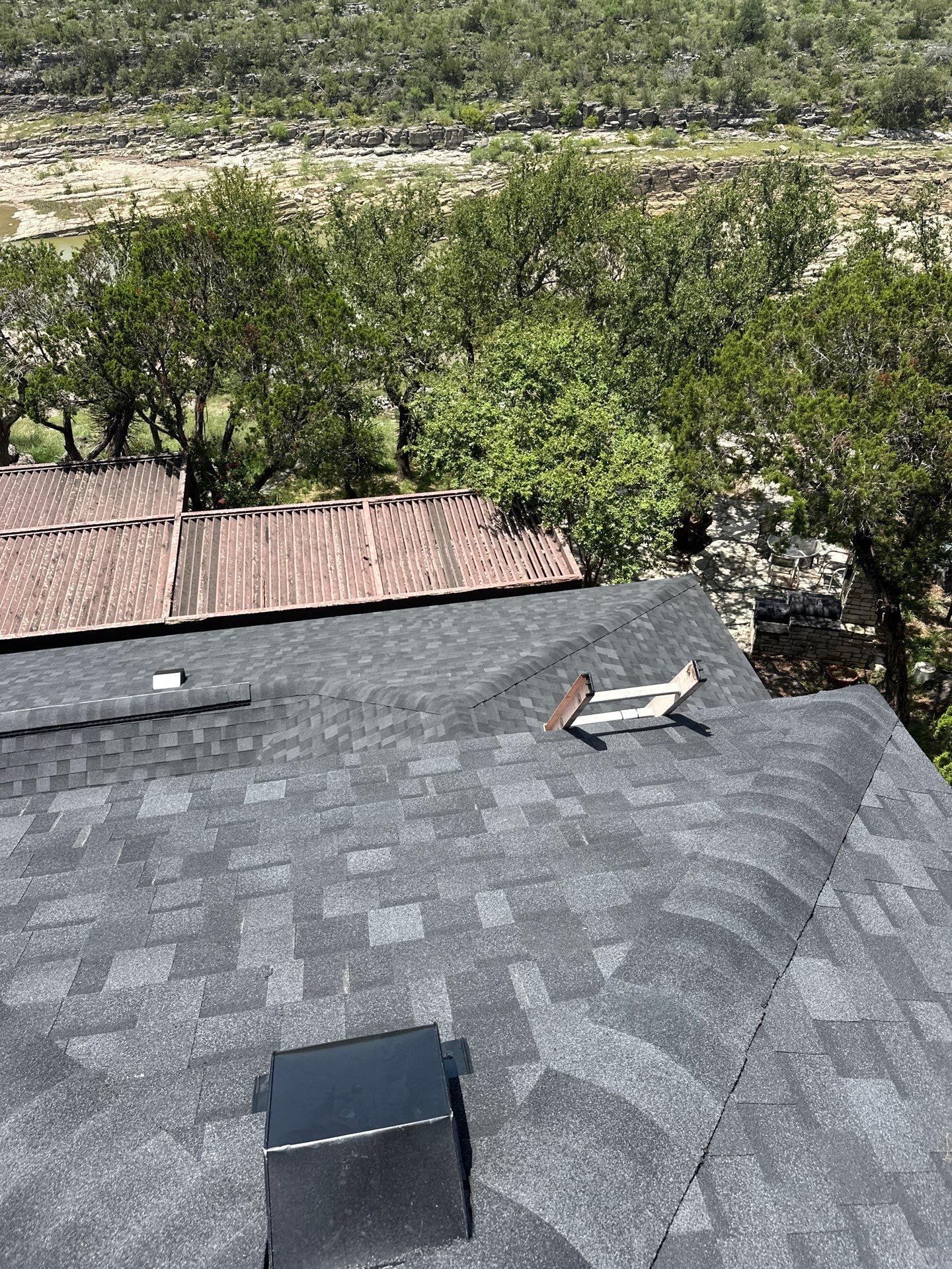 Residential Roofing Installation using IKO Nordic Granite Black by DeZign Roofing & Exteriors