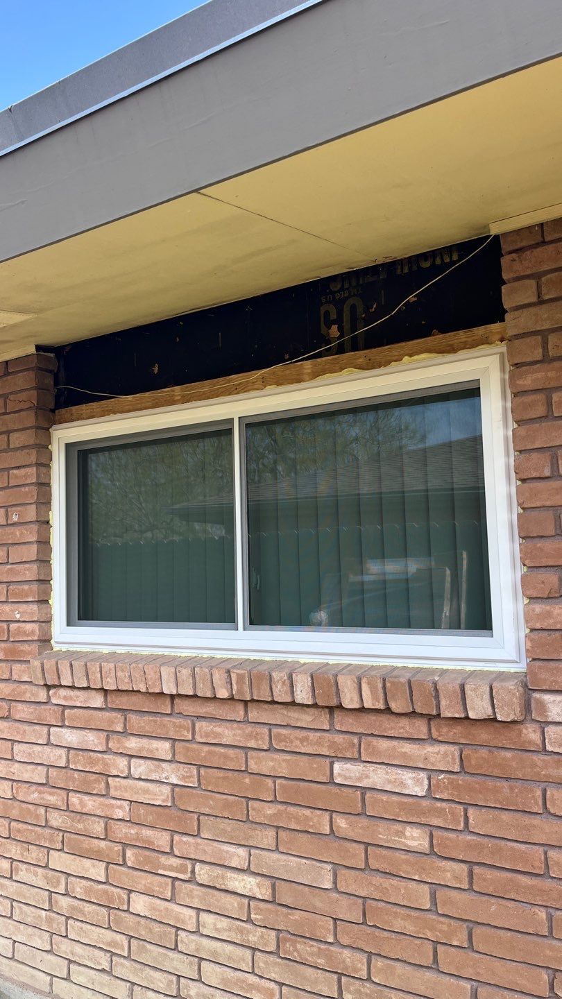 Windows in Brick with a Bay Window by Bayfront Roofing and Construction