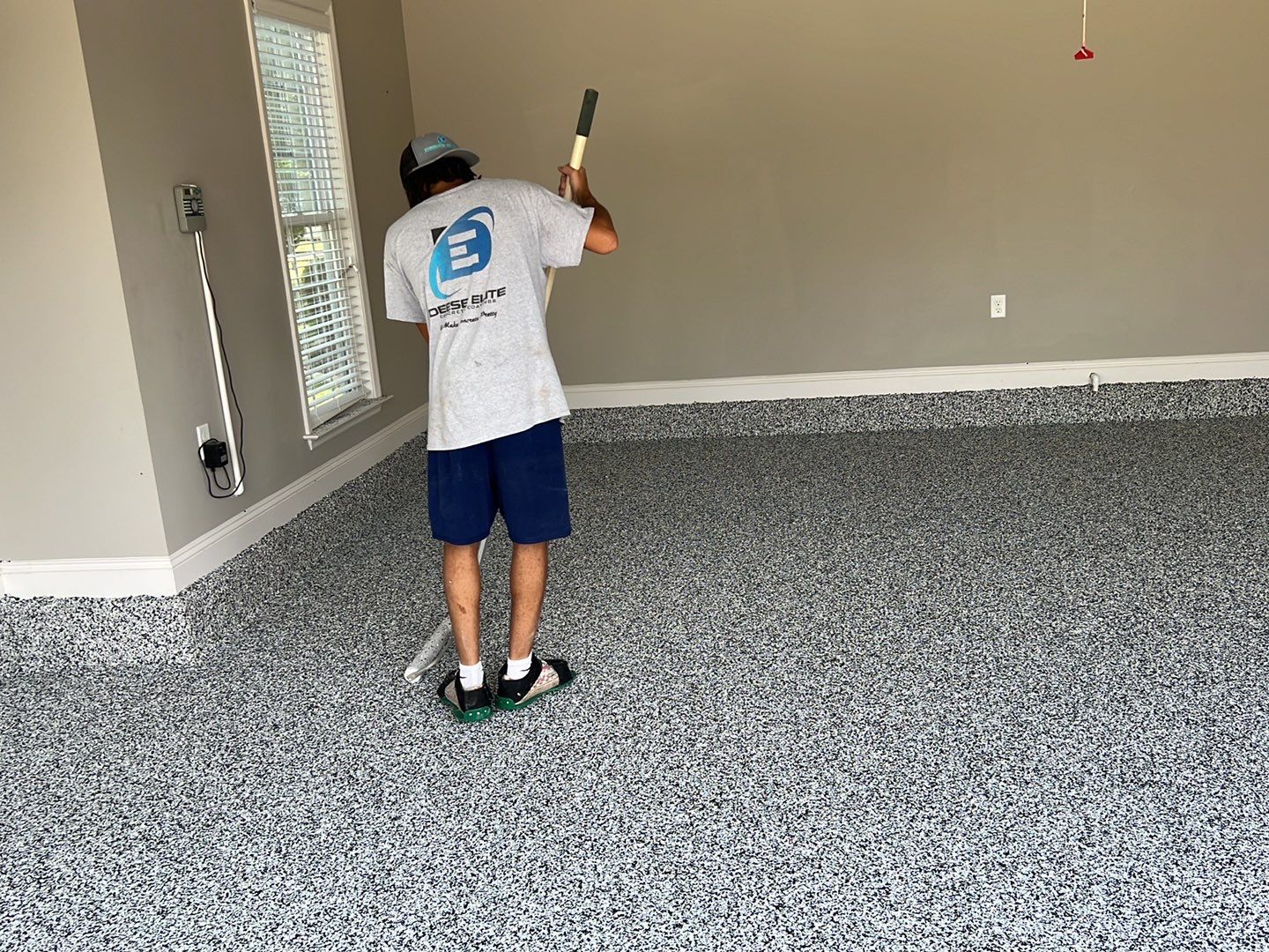 Domino Does It!  by Deese Elite Concrete Coatings