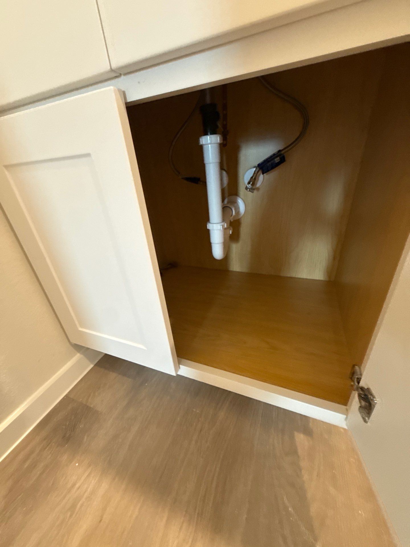 White Shaker Kitchen Cabinet and Bathroom Vanity Installation in Willis by Roaring Lion Renovation, LLC
