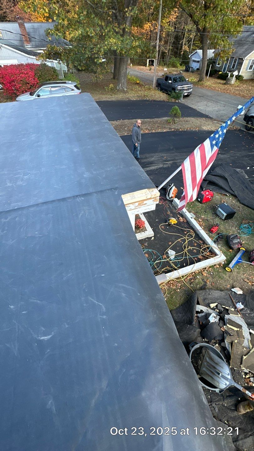 Westford EPDM Flat Roof with Gutter & Soffit/Fascia Replacement by Mighty Dog Roofing of Greater Middlesex County