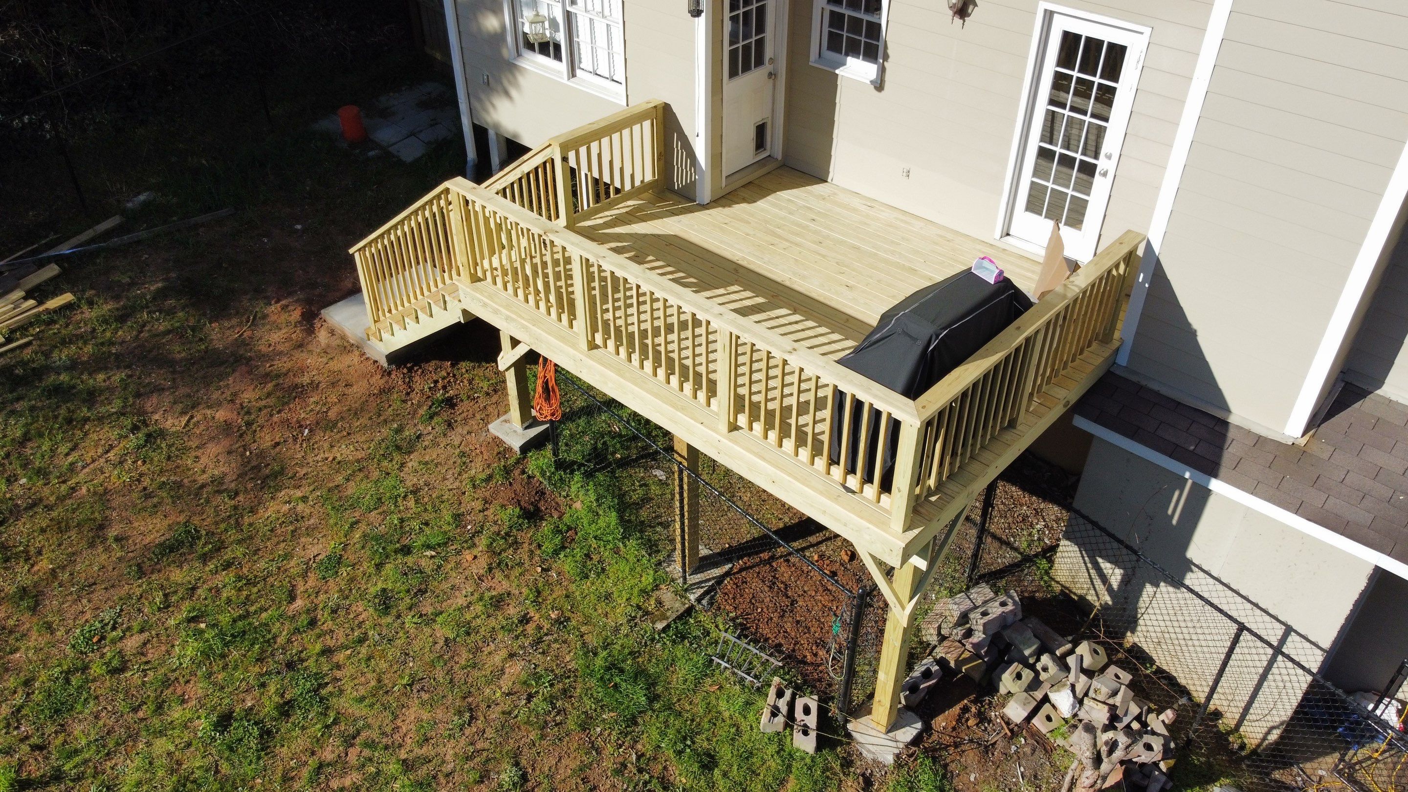 Elevated Pressure-Treated Wood Deck Replacement in Marietta by Swift Home Renovations