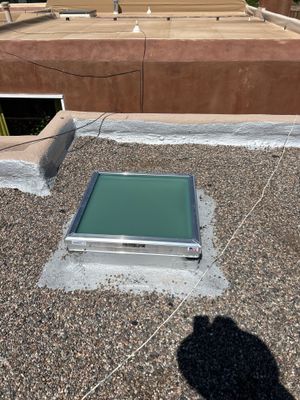 Roof Maintenance and Low-E Tempered Glass Skylight Replacement on Gravel Roof in Northwest Albuquerque