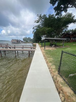Retaining Cap Sidewalk at Cedar Creek Lake in Gun Barrel City by Rodriguez Concrete Construction