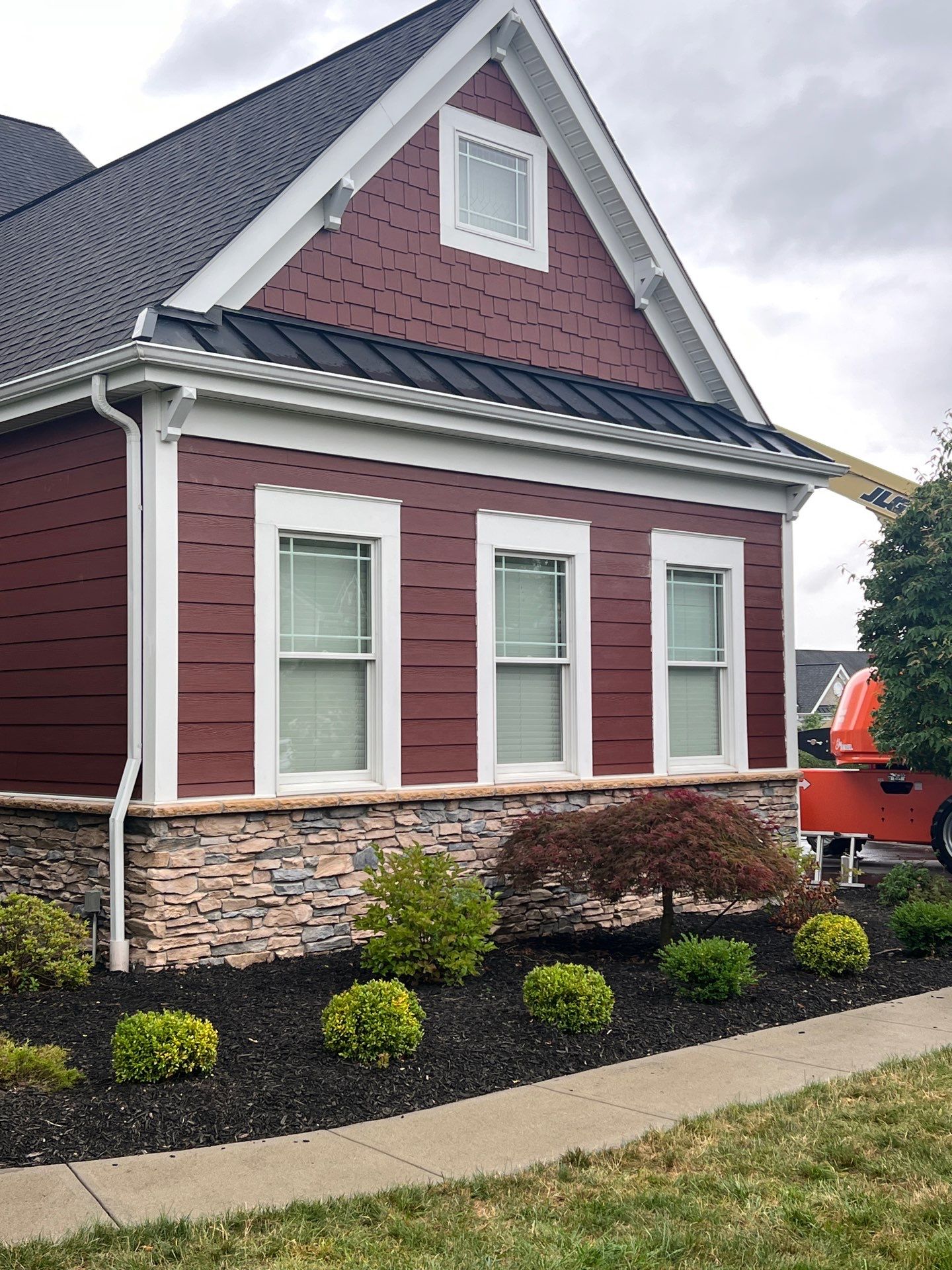 Countrylane Red James Hardie Siding Replacement in Franklin Park by Knockout Home Solutions